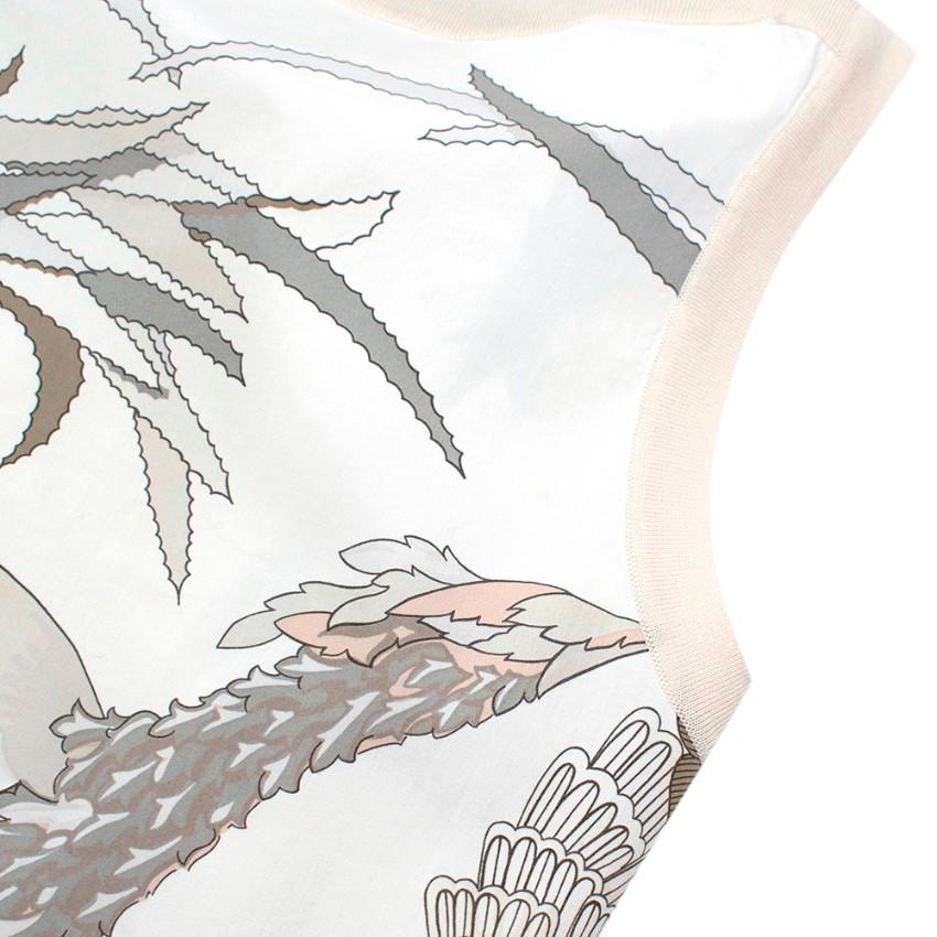 Hermes Ivory Scarf Print Sleeveless Shift Dress

- Round neck 
- Knitted panel down the back 
- Sleeveless 
- Leaf motif pattern all over 
- Shift style

Materials:
Main fabric:
- 100% Cotton
Knitted details:
- 100% Virgin Wool

Dry clean only