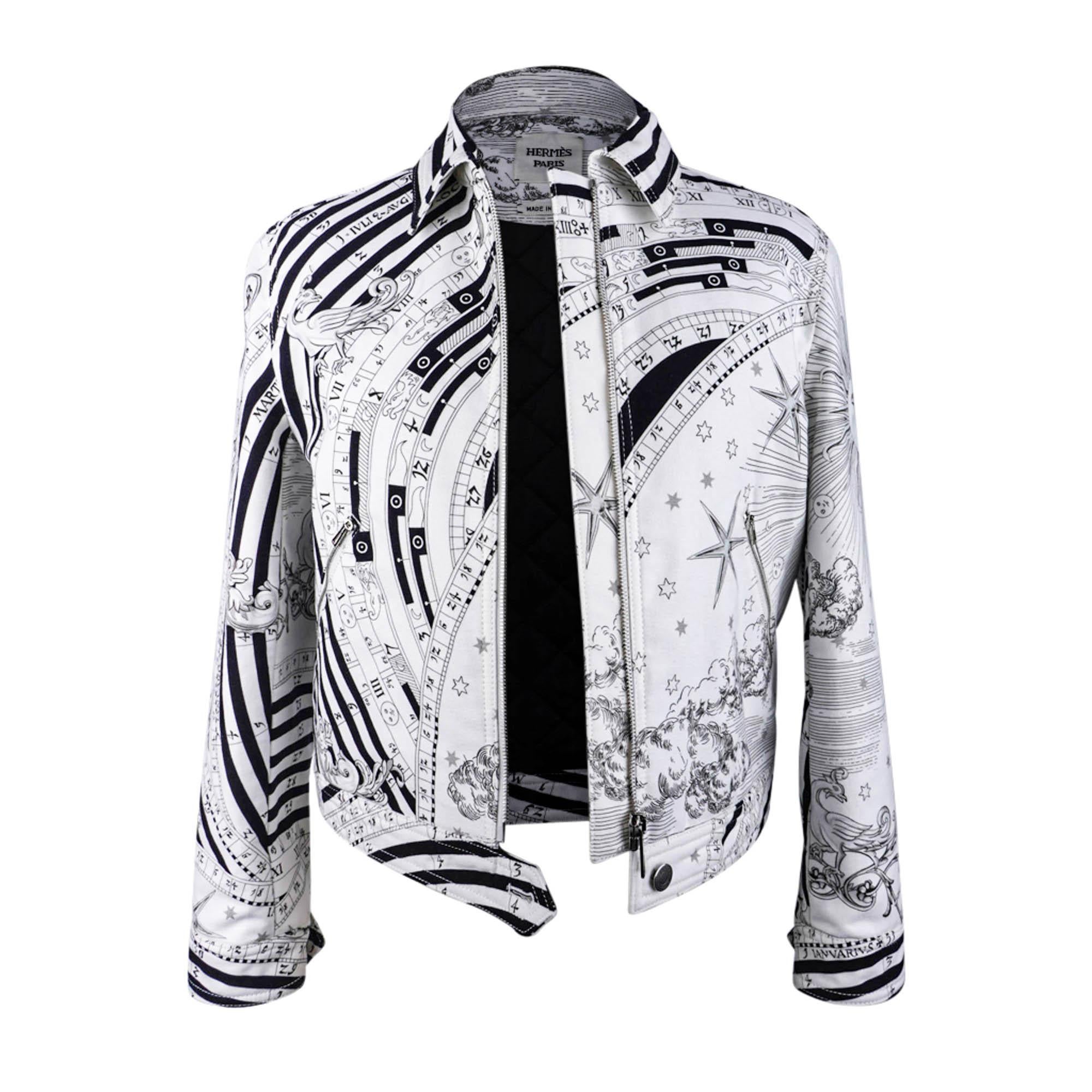 Mightychic offers an Hermes Brides De Gala Bandana bomber jacket featured in Black and White.
Zip front with palladium Touret pull.
Two pockets.
Ribbed cashmere at collar, cuffs and waist.
Fabric is silk.
Lined in Black silk.
NEW or NEVER