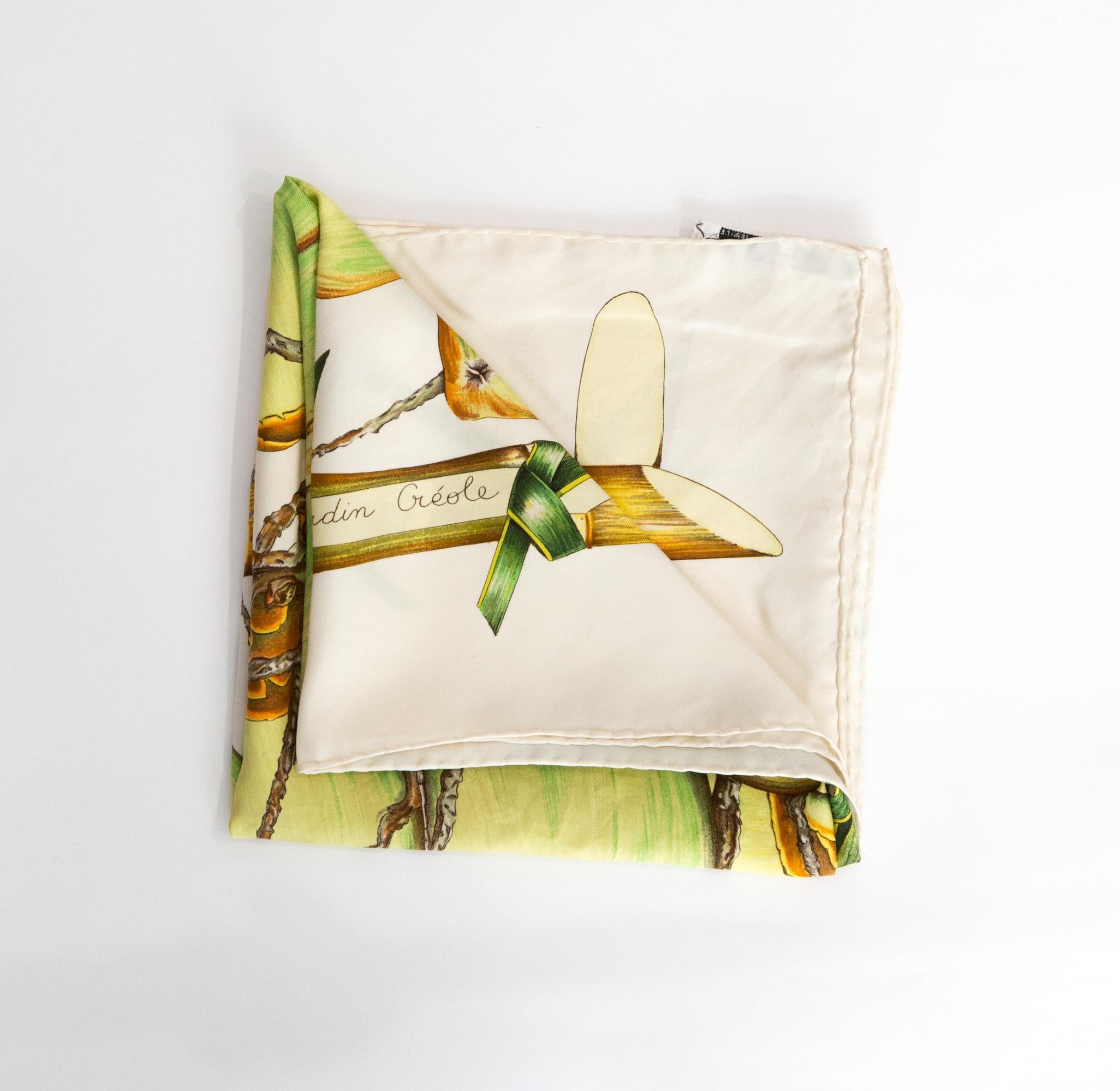Hermes « Jardin Creole » by Valérie Dawlat-Dumoulin silk scarf featuring an ivory border and a Hermès signature. 
Circa 1994
In good vintage condition. Made in France.
35,4in. (90cm)  X 35,4in. (90cm)
We guarantee you will receive this  iconic item