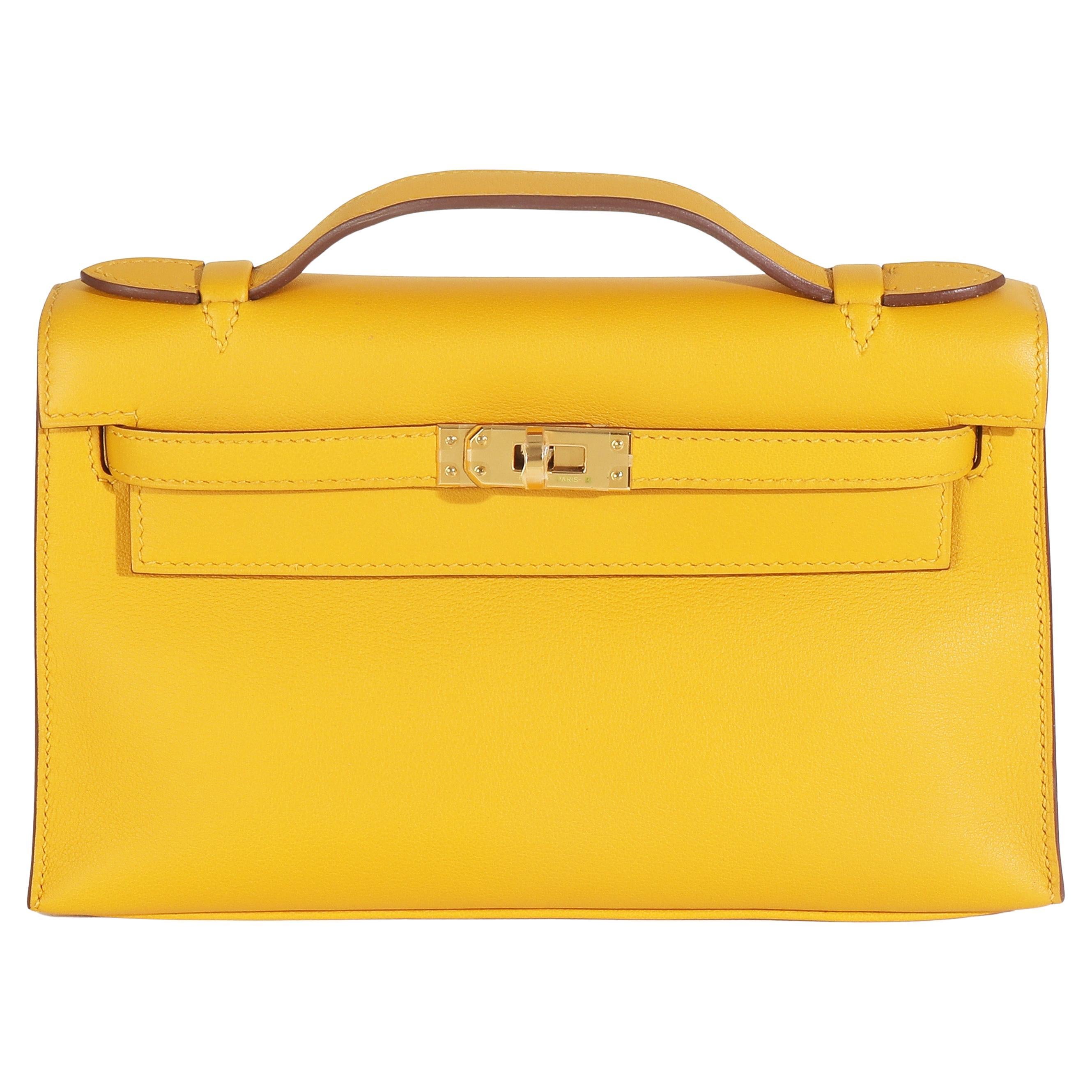 Hermès Jaune Ambre Swift Kelly Pochette GHW im Angebot