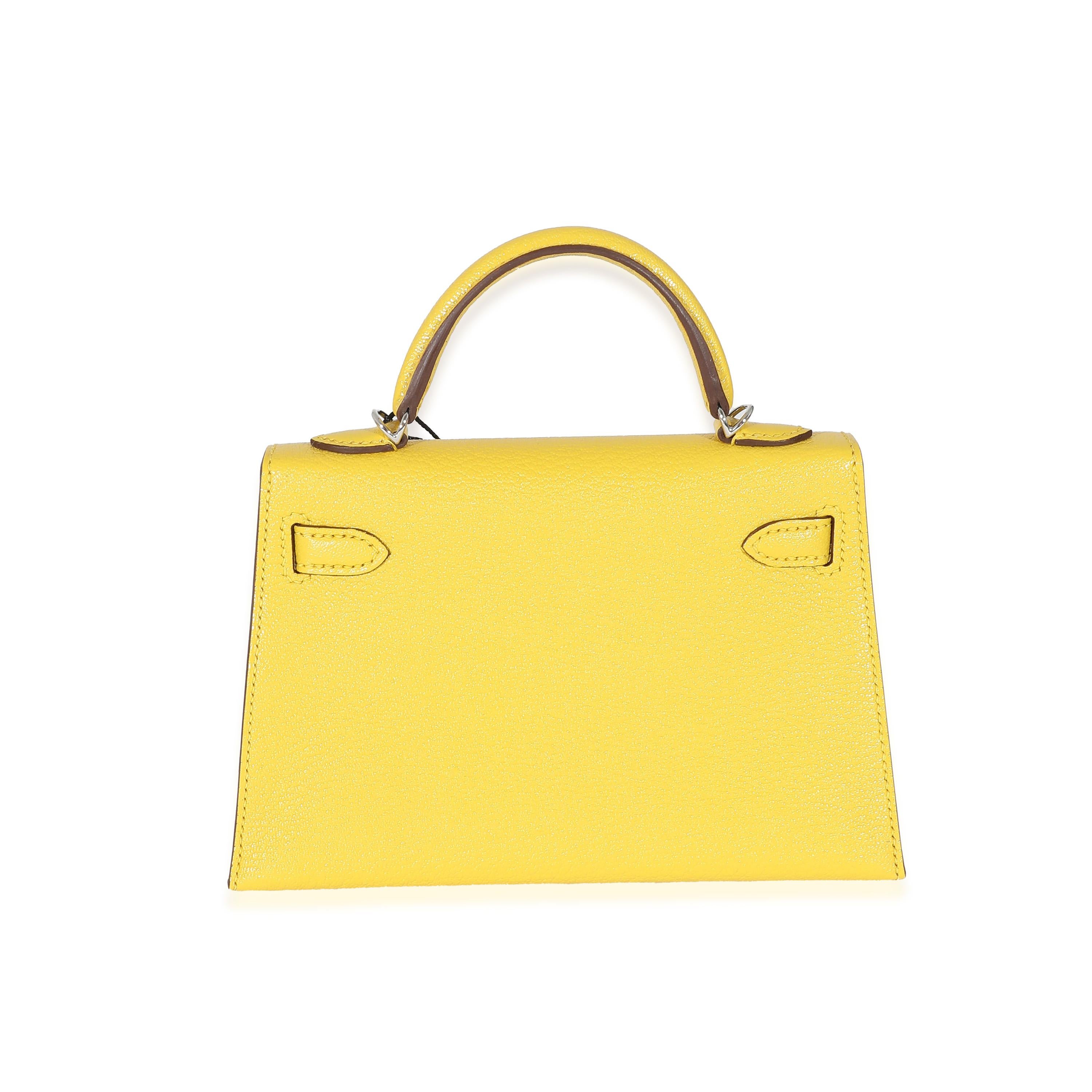 Listing Title: Hermès Jaune De Naples Beton Verso Chevre Mysore Mini Sellier II Kelly 20 PHW 
SKU: 132203
Condition: Pre-owned 
Condition Description: Officially renamed in 1977, the Kelly tote bag from Hermès was originally called the Sac à