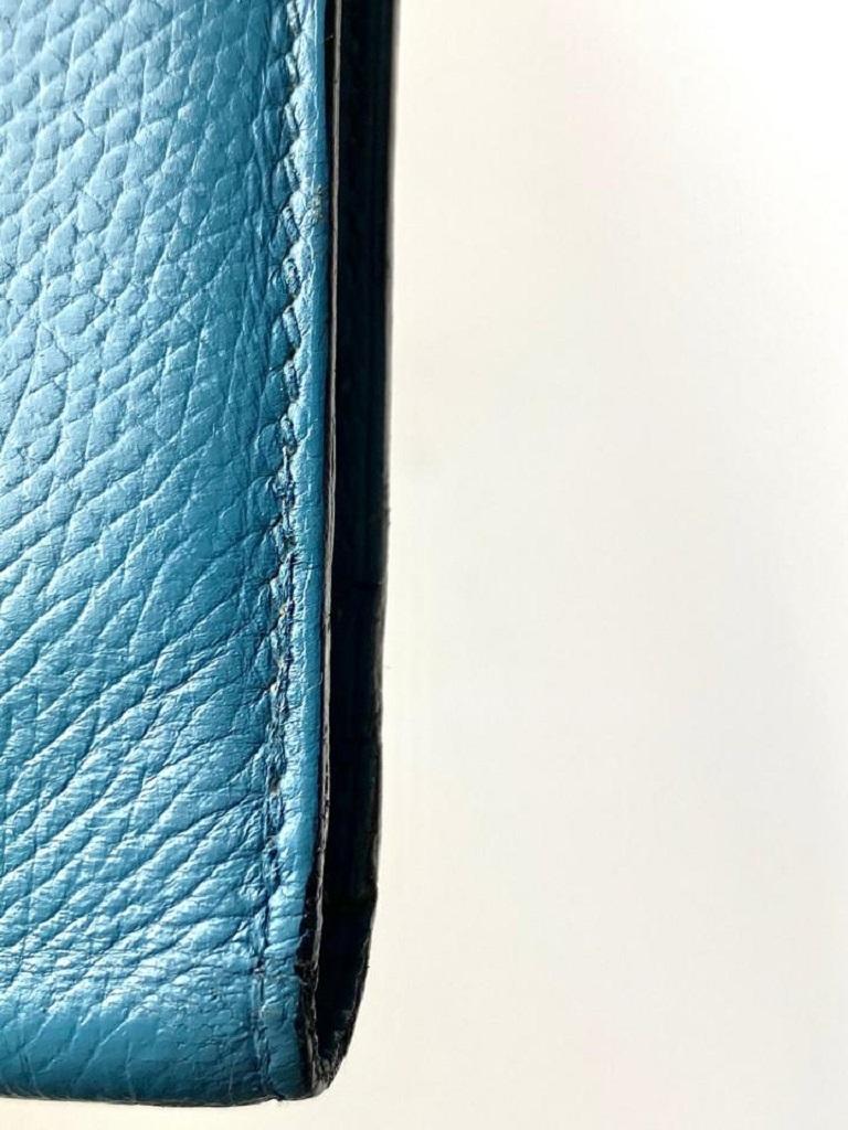 Hermès - Portefeuille long en cuir bleu « Jean Bearn », 11h68 2