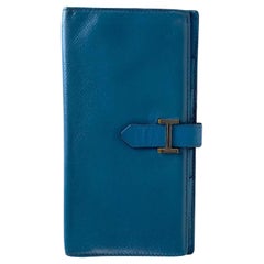Hermès - Portefeuille long en cuir bleu « Jean Bearn », 11h68