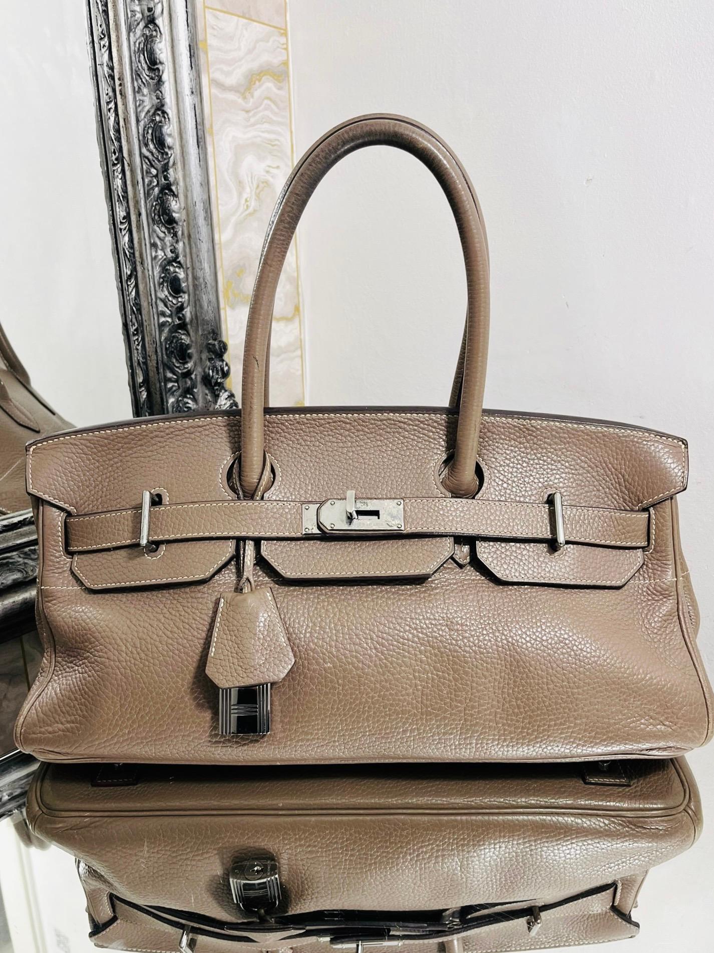 Hermes Jean Paul Gaultier Birkin 42cm Bag

Shoulder version of the iconic Birkin bag designed by Jean Paul Gaultier.

Taupe colour with palladium hardware, to include clochette, padlock and keys.

Size - Height 19cm , Width 42cm, Depth