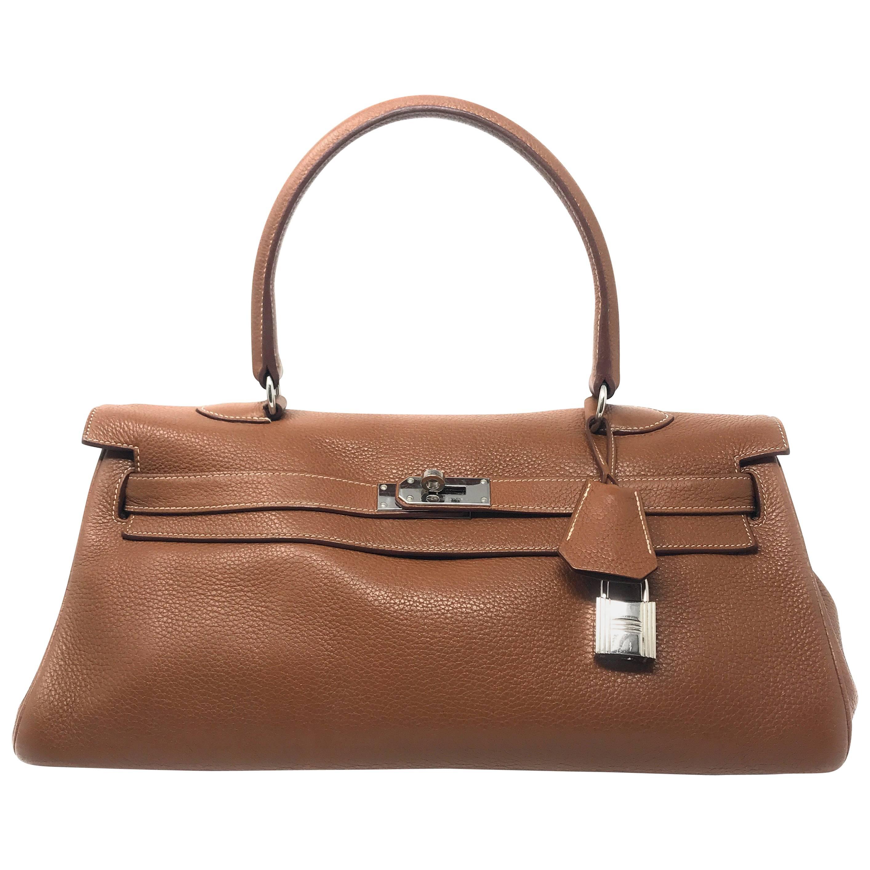 Hermes Jean Paul Gaultier Gold color leather and the Palladium hardware For Sale