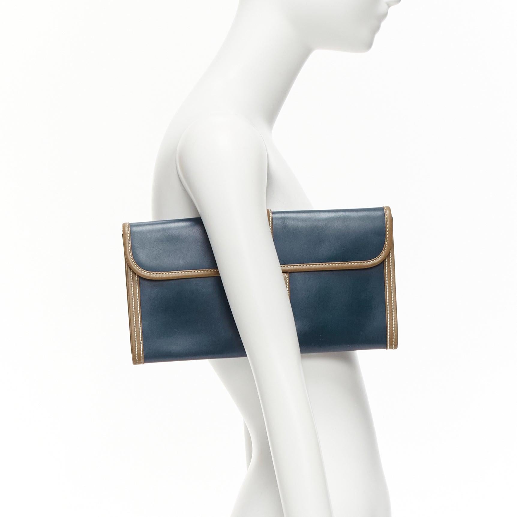 HERMES Jige Elan 29 blue taupe H logo swift leather loop through clutch bag
Reference: AAWC/A00943
Brand: Hermes
Model: Jige Elan 29
Material: Leather
Color: Blue, Brown
Pattern: Solid
Closure: Loop Through
Lining: Blue Leather
Extra Details: This