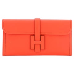 Jigé Elan Clutch in chalk swift calfskin, size 29 (29 x 15 x 3 cm),  lambskin lining, hand held Color : chalk