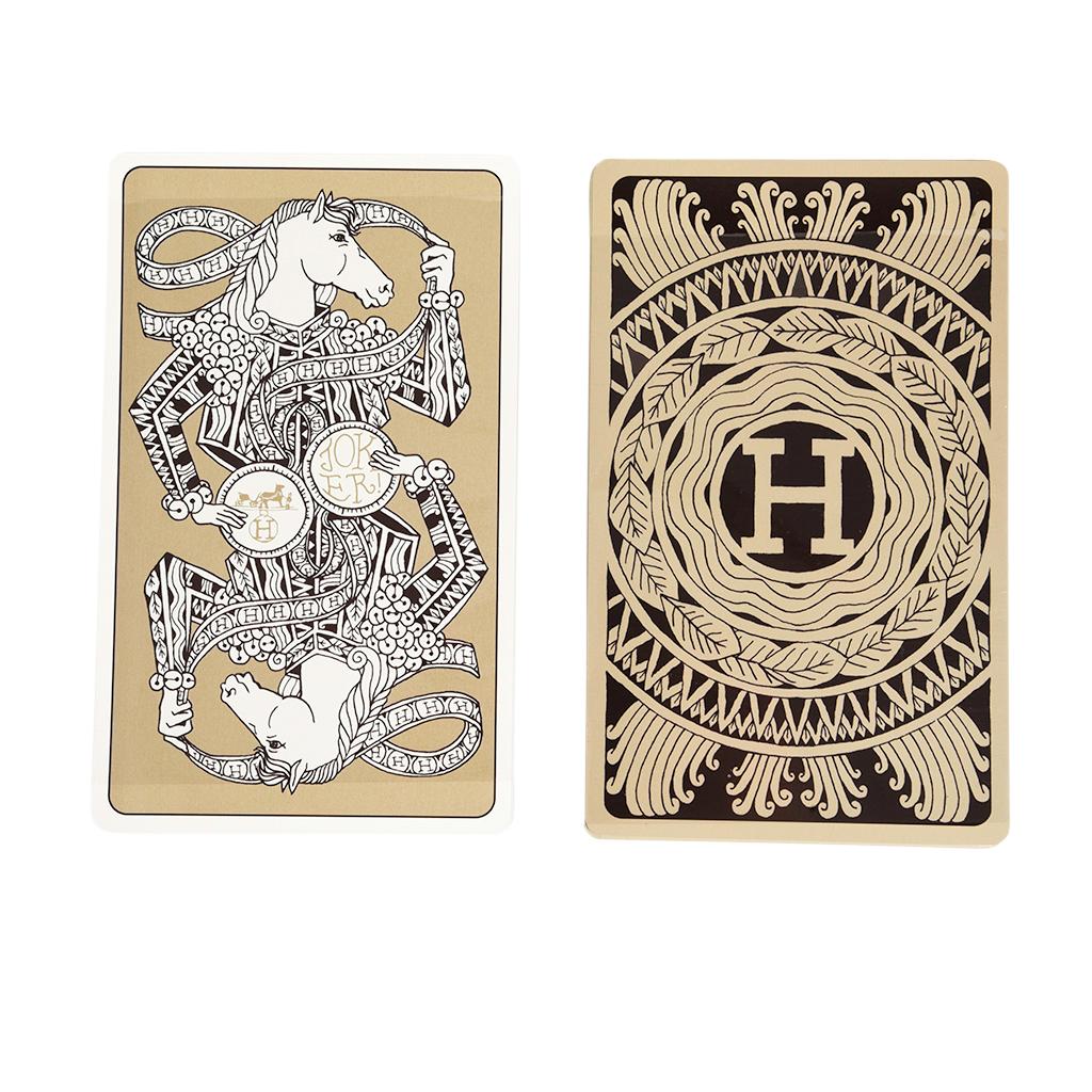 Guaranteed authentic rareHermes Jumbo 52-piece playing card set. 
Cards are beautifully detailed with Les 4 Mondes design on the rear. 
Trim color is silver.
The cards are new and sealed. 
Comes with signature Hermes box.
final sale

SIZE OF CARD: 