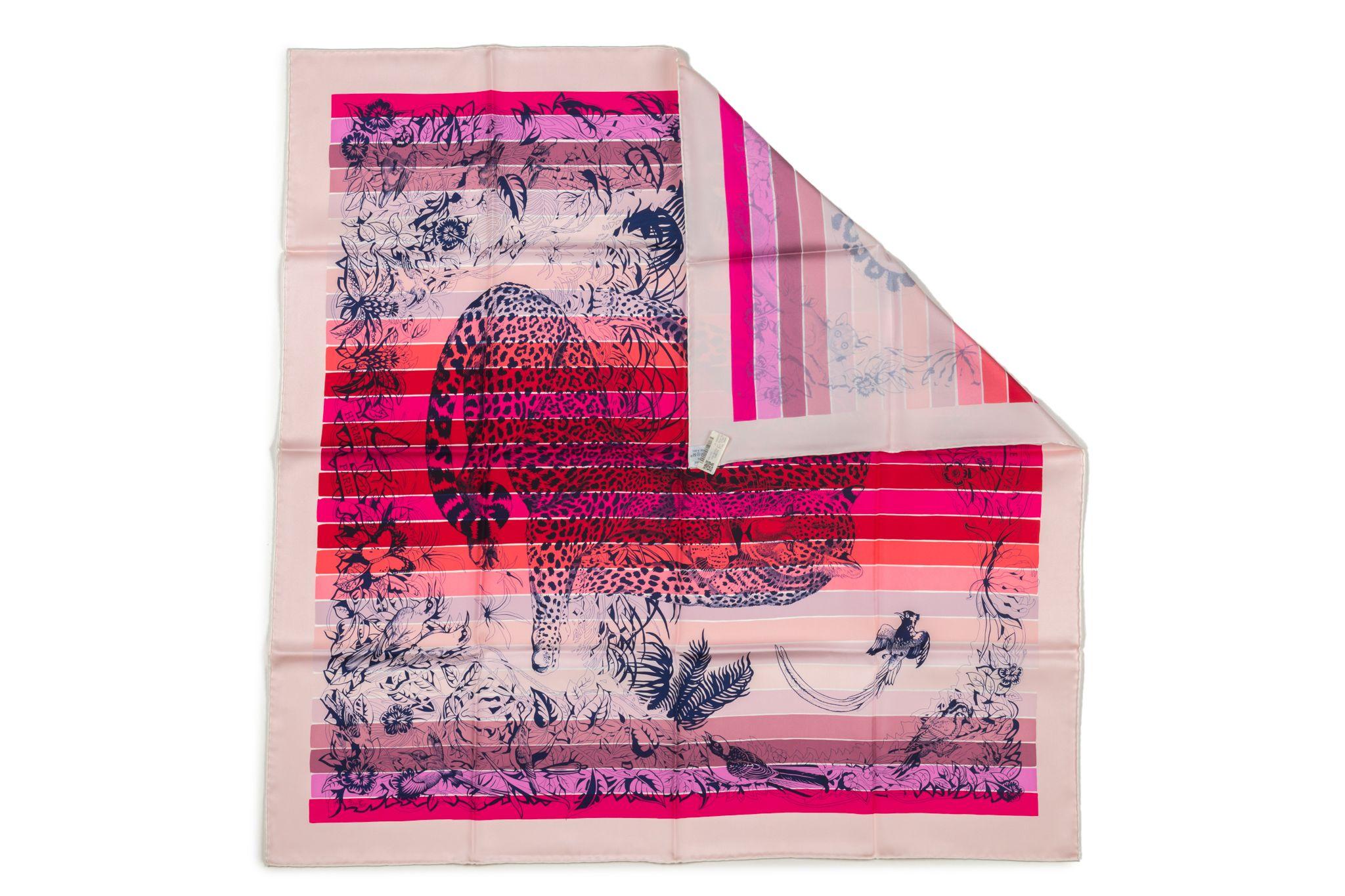 Hermès new silk twill scarf featuring a multi-colored Jungle Love Rainbow pattern design, and hand rolled edges.