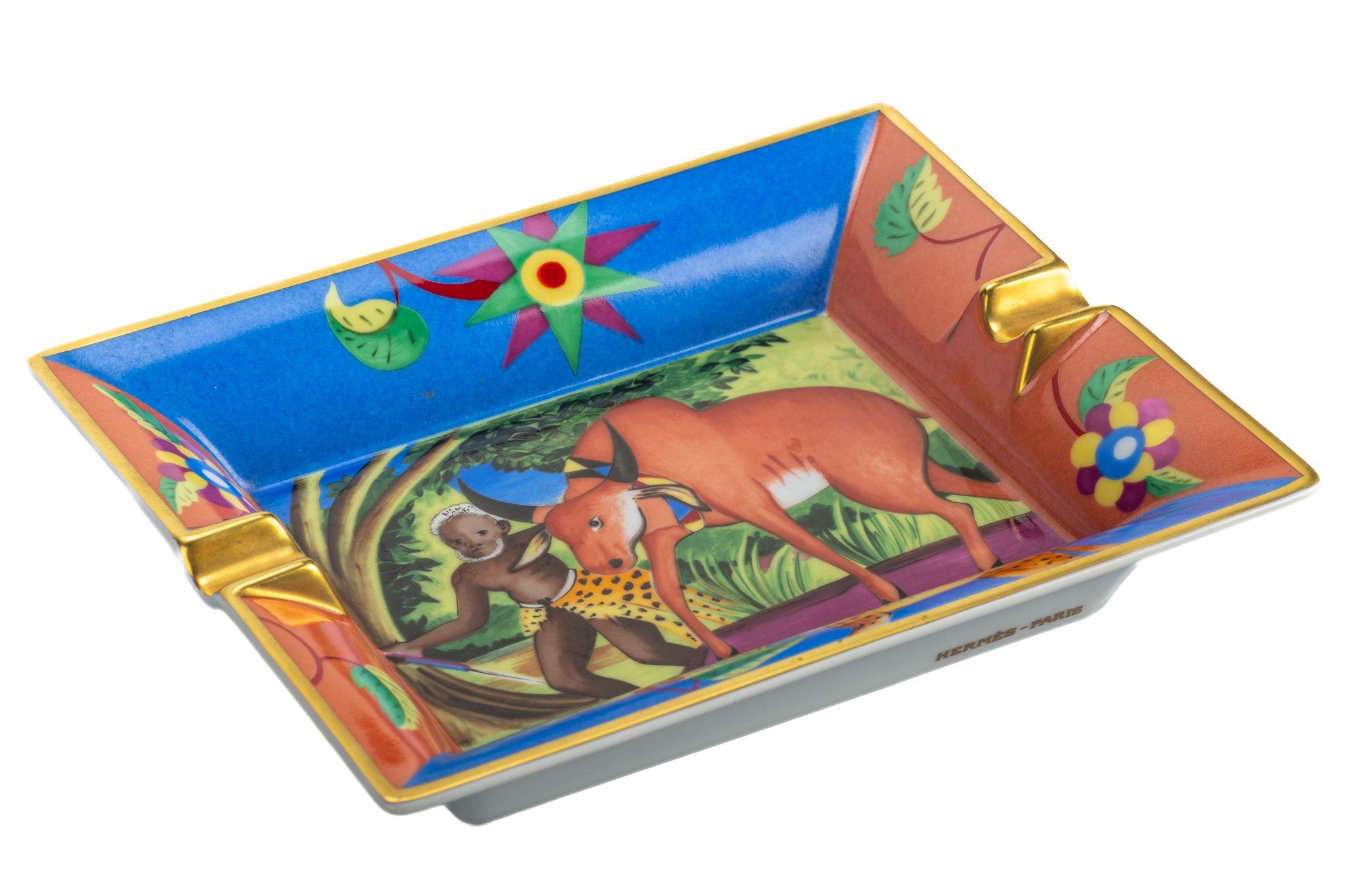 Hermes blue, green and brown porcelain ashtray with a jungle scene design
