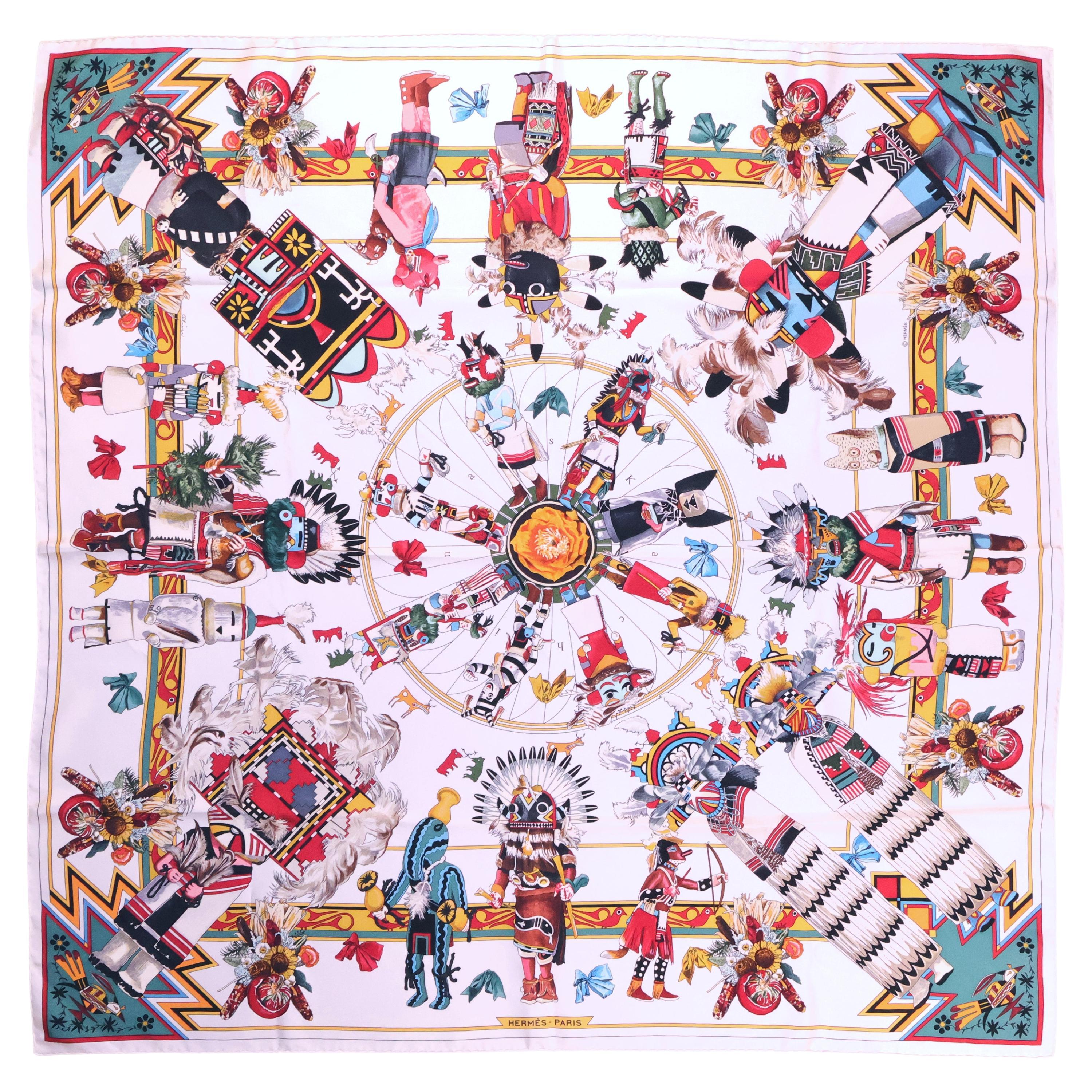 Hermès "Kachinas" 90cm White 
Multi Color Silk Scarf by Kermit Oliver, 2004. im Angebot