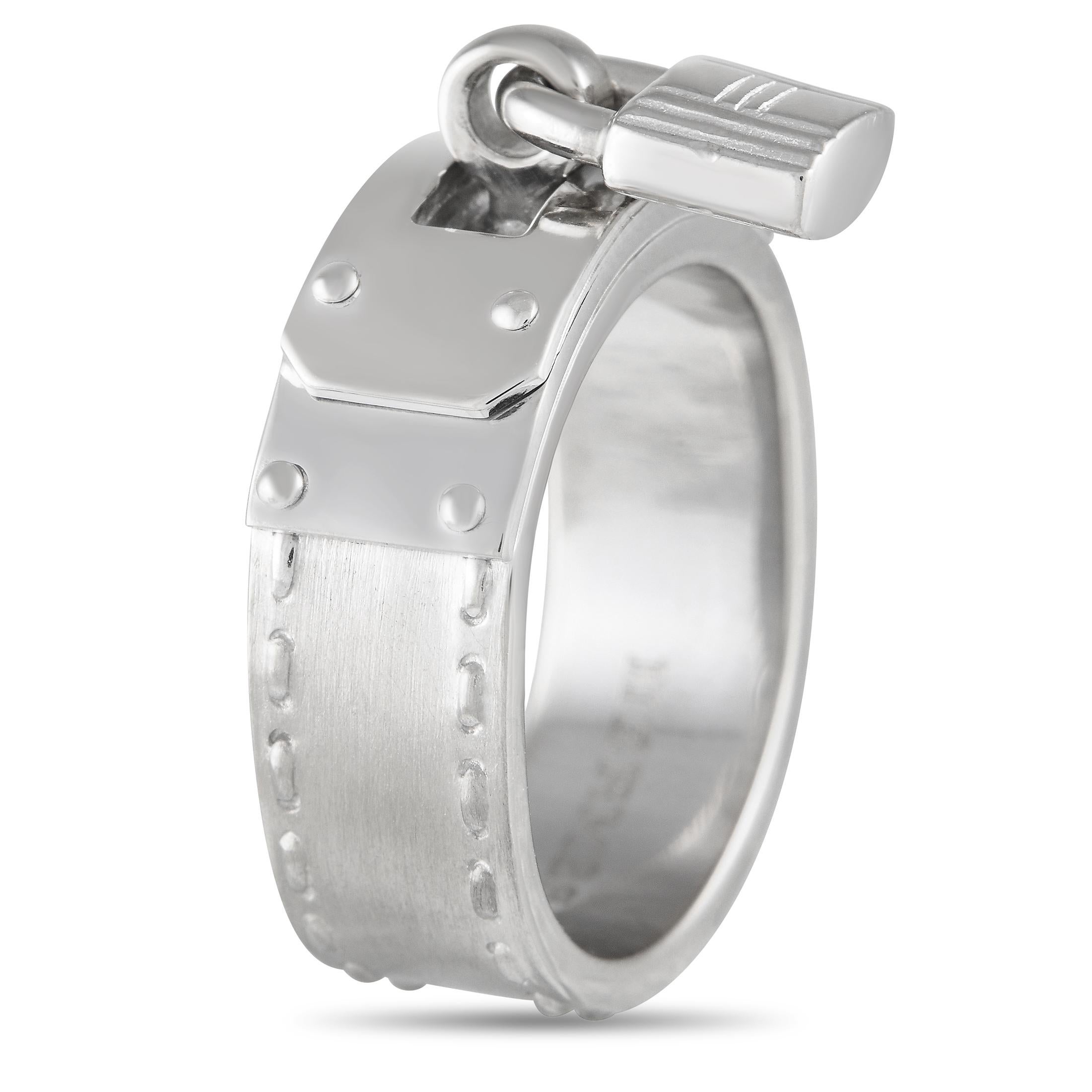 A charming lock accent makes this Hermes Kelly ring an elegant addition to any ensemble. Crafted from 18K white gold, this piece features a 7mm wide band and a top height measuring 6mm.\r\nThis jewelry piece is offered in estate condition and