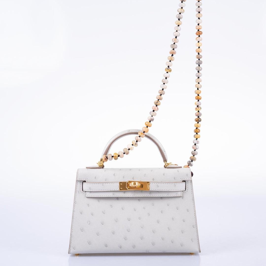 De las mujeres Hermès Kelly 20 Mini II Sellier Gris Perla Avestruz con Herrajes Dorados en venta