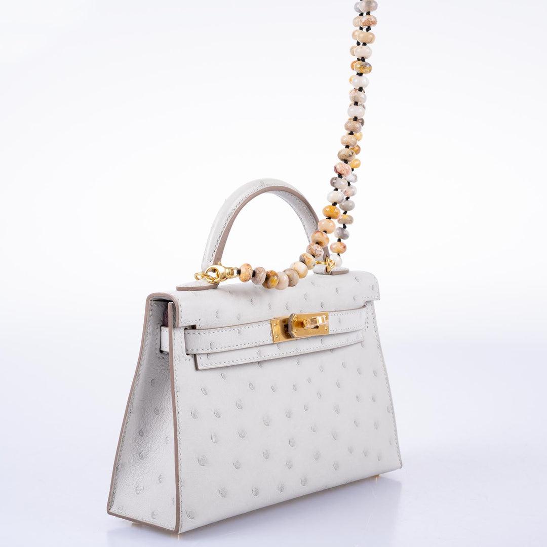 Hermès Kelly 20 Mini II Sellier Gris Perla Avestruz con Herrajes Dorados en venta 1