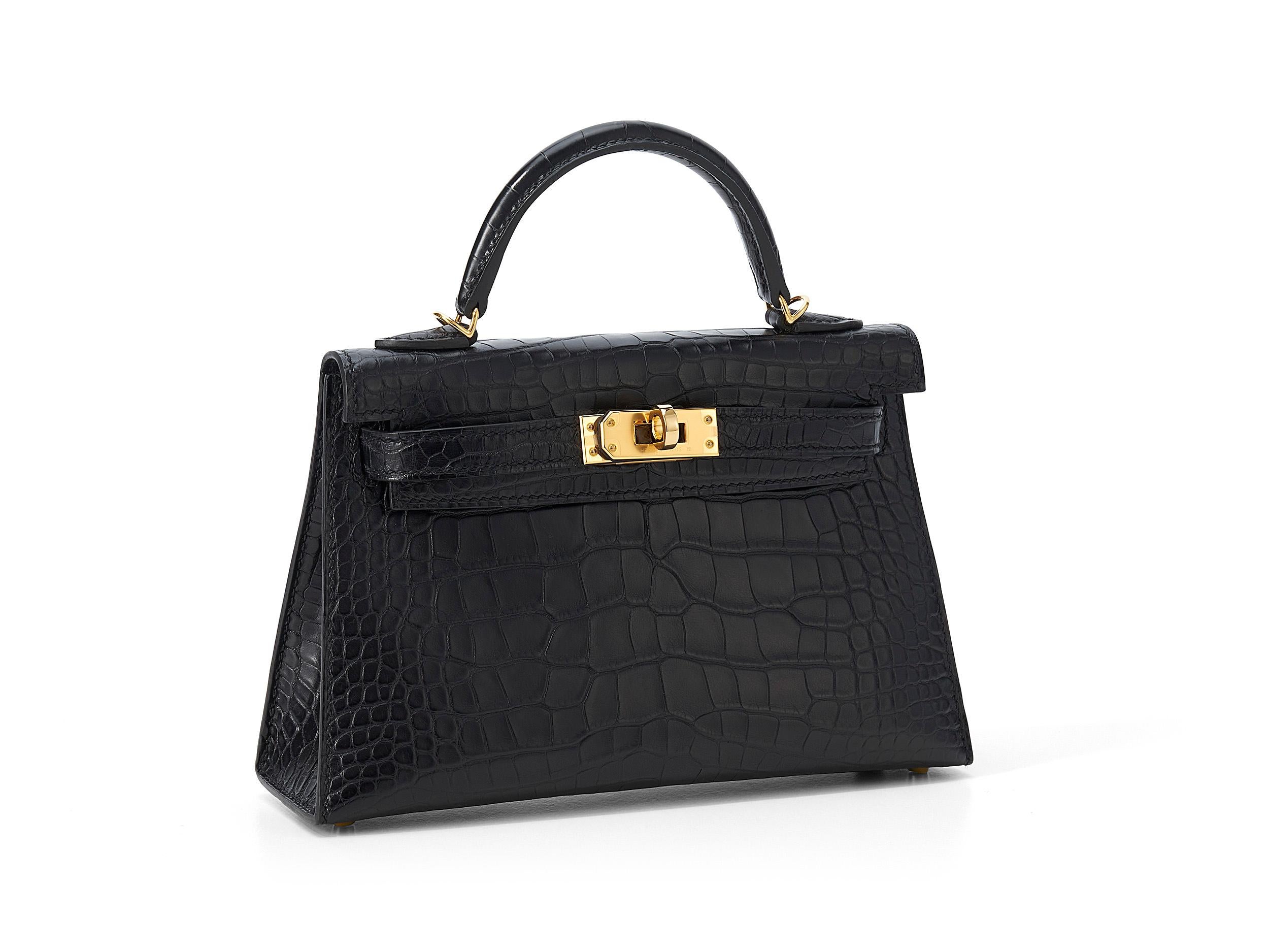 Hermès Kelly 20 mini in black and matte alligator leather with gold hardware. The bag is unworn and comes as full set including the original receipt and cites.

Stamp Y (2020) 

