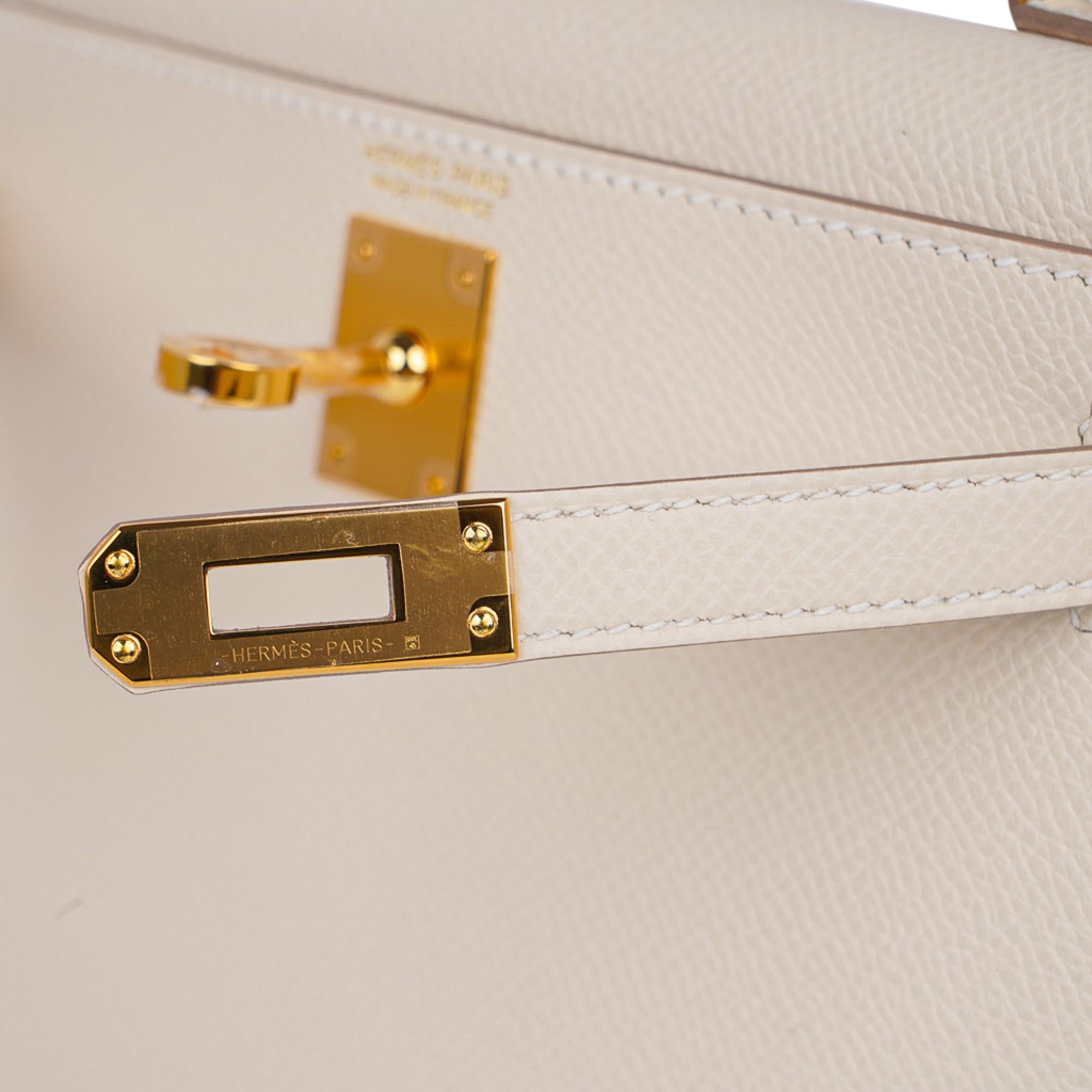 Guaranteed authentic Hermes Kelly 20 Sellier Mini bag.
Coveted neutral Craie Epsom leather with gold hardware.
Carry by hand, shoulder or cross body.
Divine size for day to evening. 
Comes with signature Hermes box, shoulder strap, and sleeper.
NEW