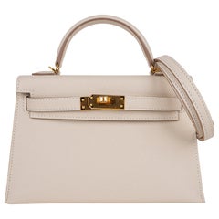 Sac Hermès Kelly 20 Mini Sellier Craie Epsom avec équipement doré