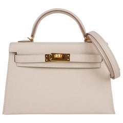 Hermes Kelly 20 Mini Sellier Tasche Craie Epsom mit Goldbeschlägen