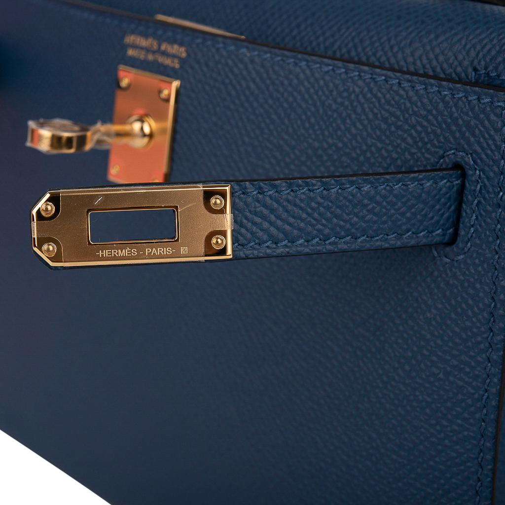 Mightychic offers a guaranteed authentic Hermes Kelly 20 Mini Sellier bag featured in rich, saturated Deep Blue. 
Epsom leather and accentuated with gold hardware.
Carry by hand, shoulder or cross body.
The Kelly 20 bag is extremely limited and