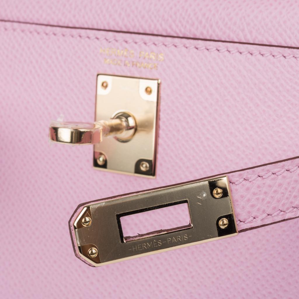 Guaranteed authentic Hermes Kelly 20 Sellier Mini ll bag. 
Rare and coveted Mauve Sylvestre Epsom leather with permabrass hardware.
Carry by hand, shoulder or cross body. 
Divine size for day to evening.
Comes with shoulder strap, signature Hermes
