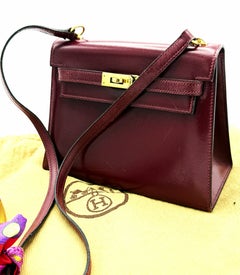 HERMÉS KELLY 20cm  bordeaux Calfskin Leather, gold hardware, small shoulder bag