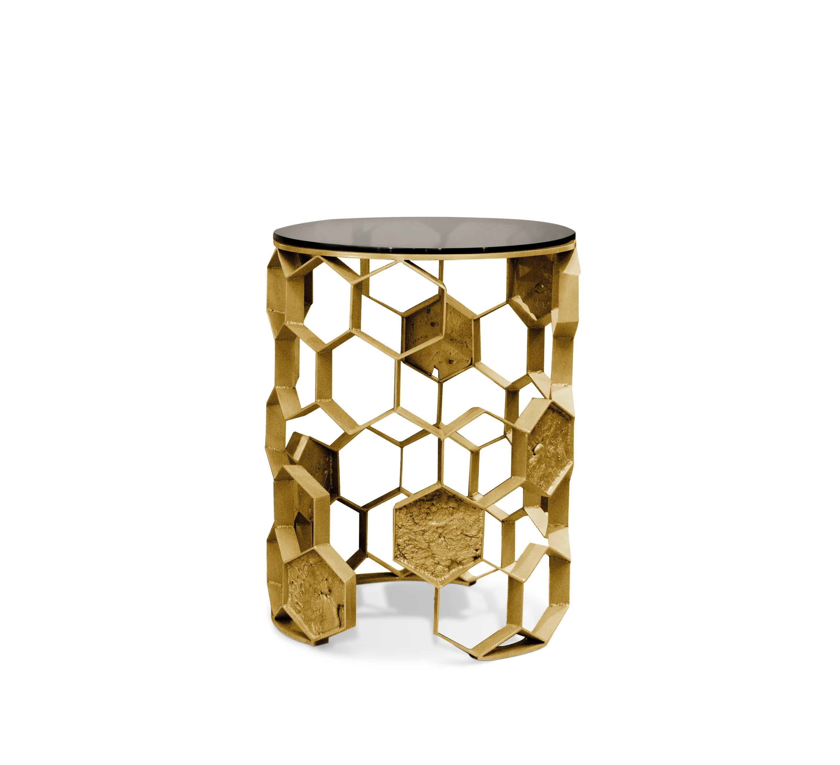 Manuka is one of the most unique and beneficial forms of honey in the world and made from a flower that only grows in New Zealand. The Manuka side table is an exquisite piece that resembles a glorious beehive. The aged matte brass structure and