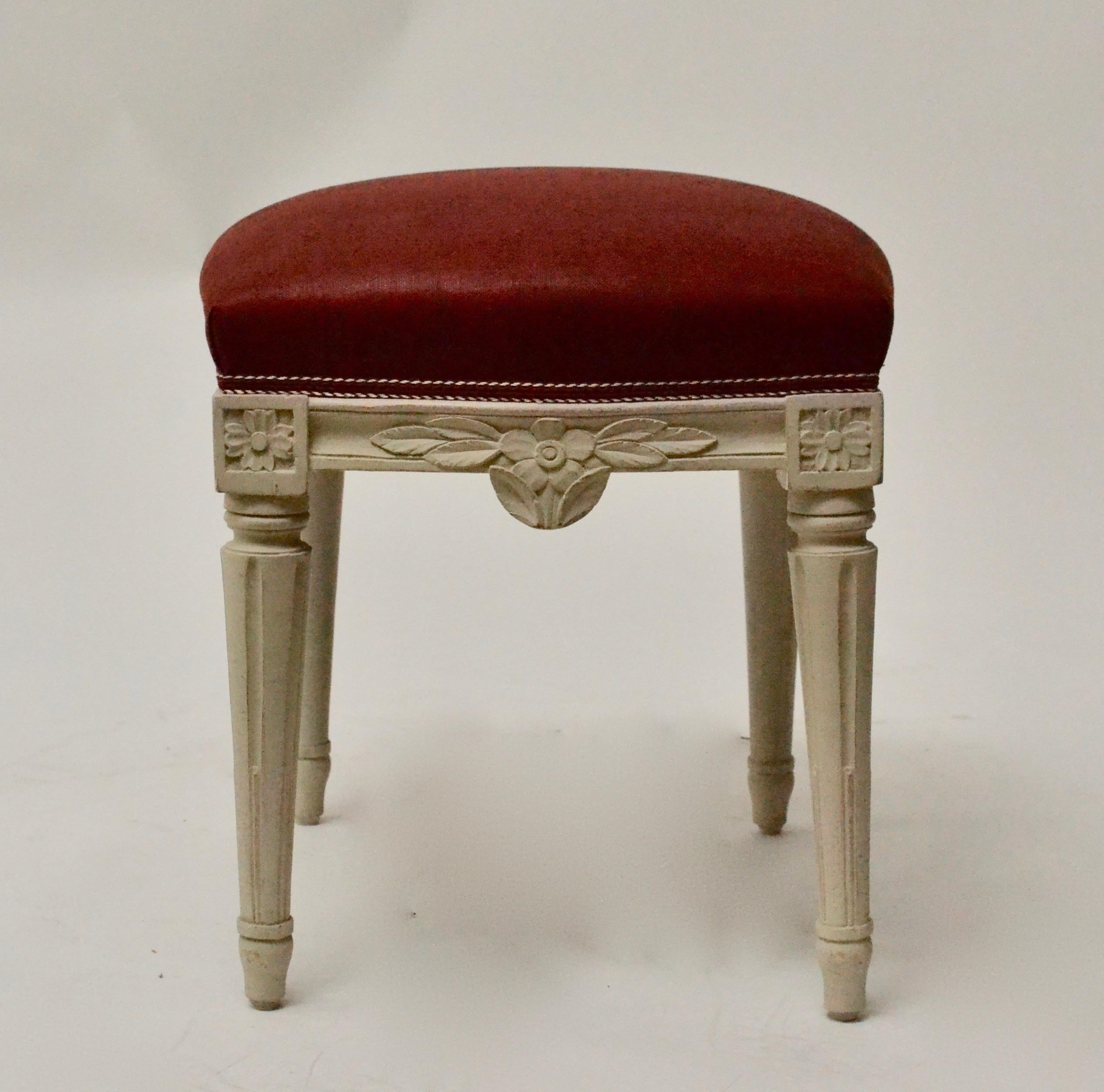 A pair of Swedish Gustavian grey painted stools signed by Jacob Malmsten (1753-1788) and with the Stockholm chair makers gild stamp.