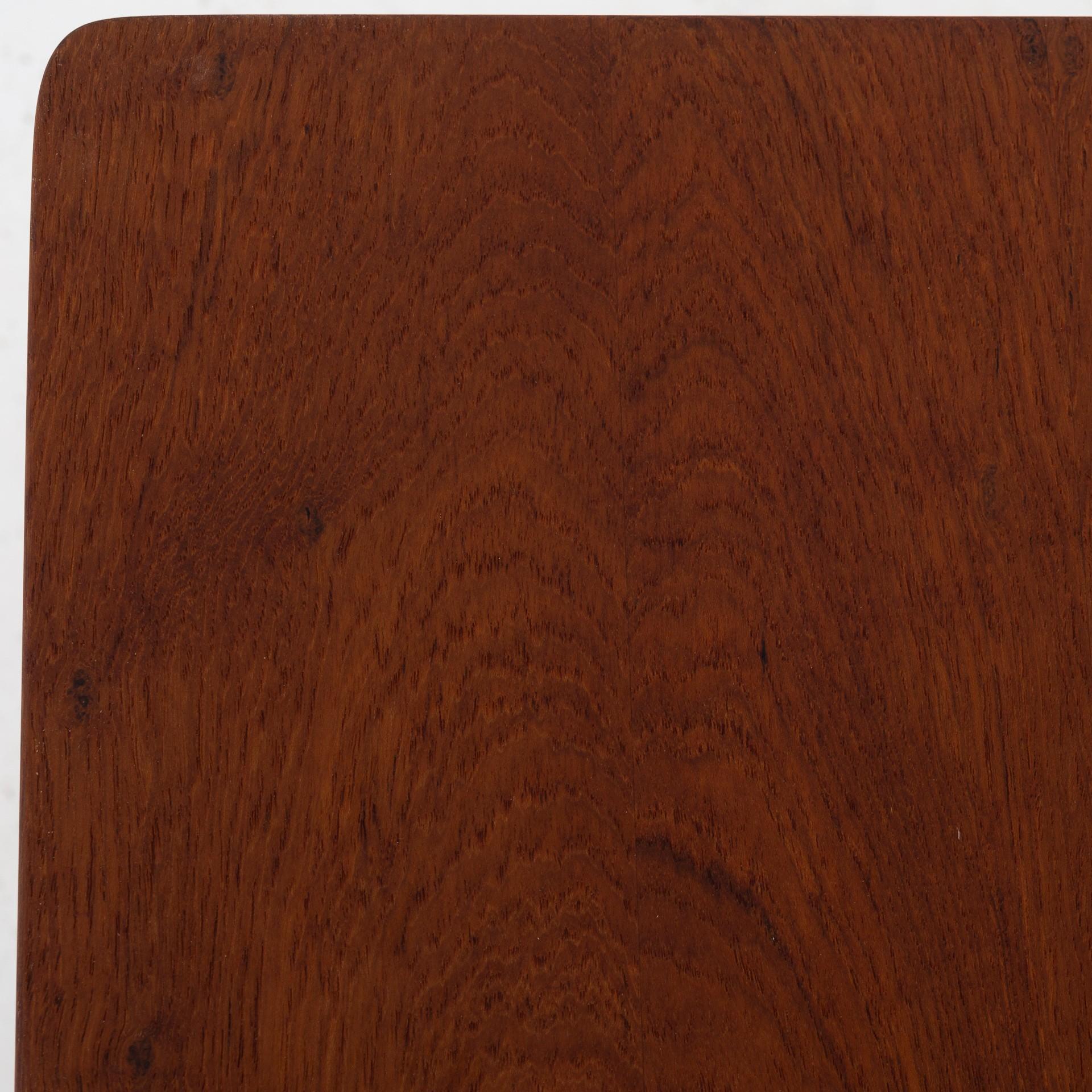 Folding table in solid teak with frame of oak. Maker Rud Rasmussen.