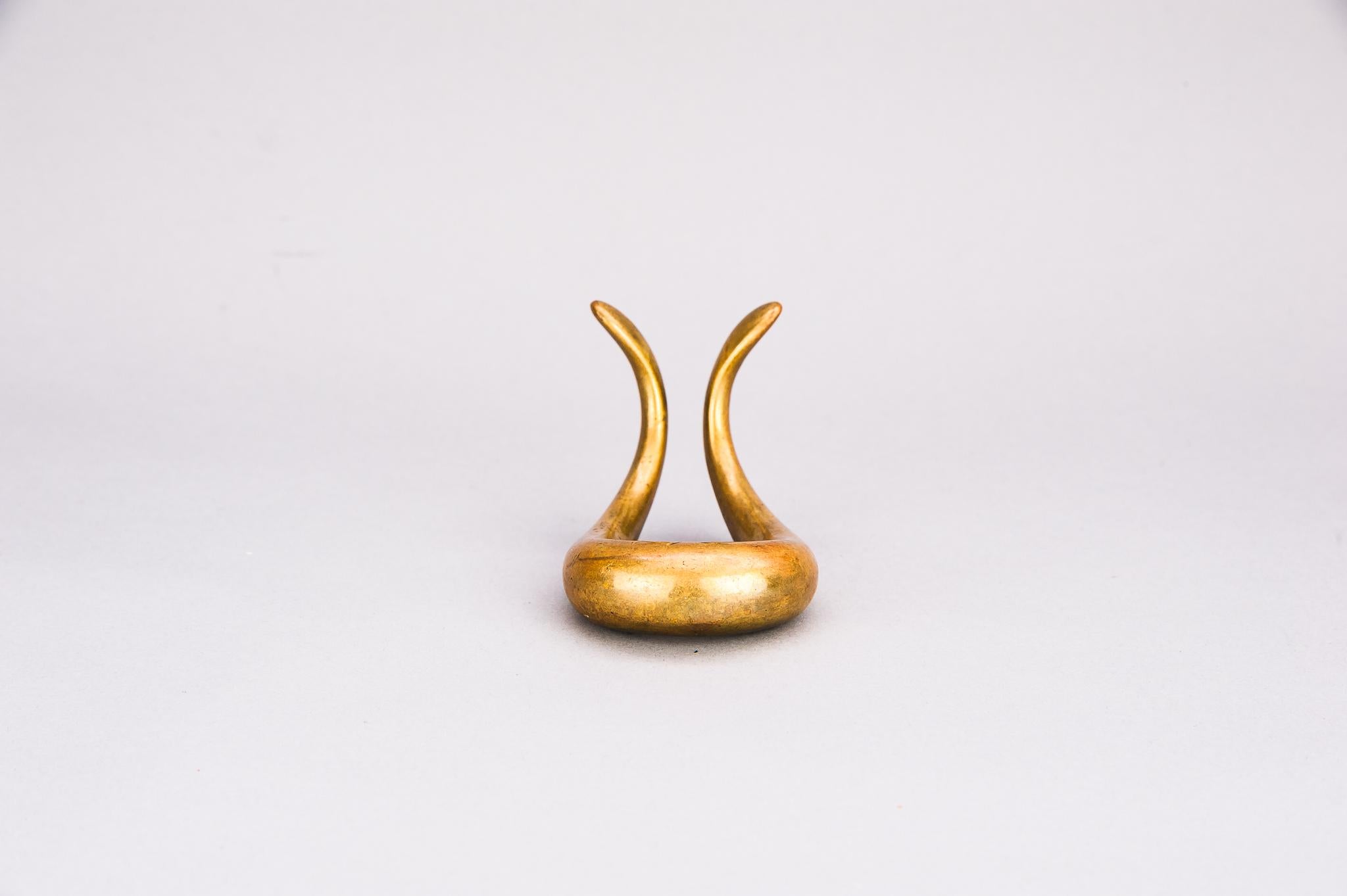 Carl Auböck brass sculptural pipe holder
Original condition.