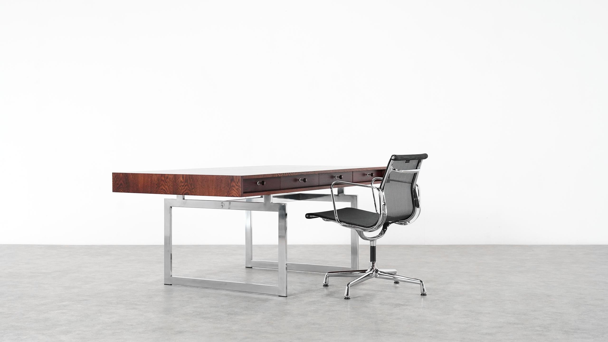 Bodil Kjaer for E. Pedersen & Søn, table model 901, wenge and chrome steel, Denmark, 1959, perfectly restored!

An exceptionally beautiful version, the veneer shows an absolutely stunning pattern. Metalbase in very good condition.
Coming with