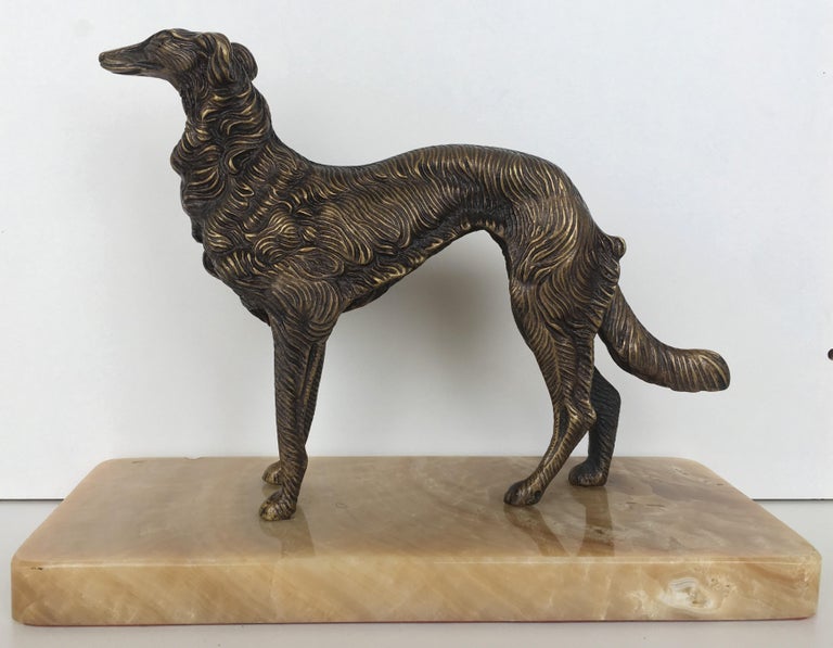 A 19th century French silver patinated bronze borzoi on a cream marble base. A beautiful depiction of this sleek handsome dog. In very good condition with slight wear to the patina. Unsigned, but in the style of Emmanuel Fremiet (French 1824-1910).