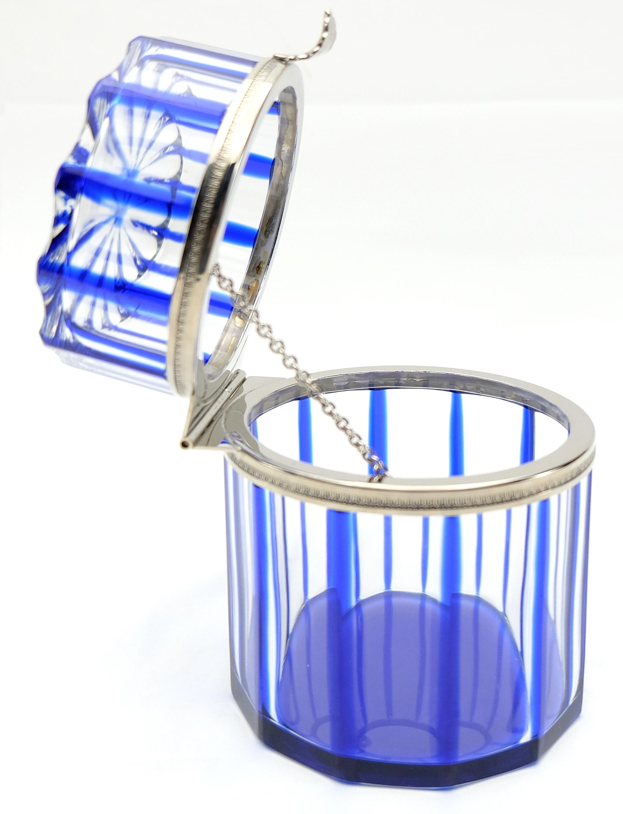 by Cristal Benito, France Cobalt Blue and Cut Crystal Lidded Box 

Offered for sale is a cobalt blue and cut crystal box with a hinged lid by crystal Benito originally designed as part of the 1950s collection. The crystal is accented by silvered