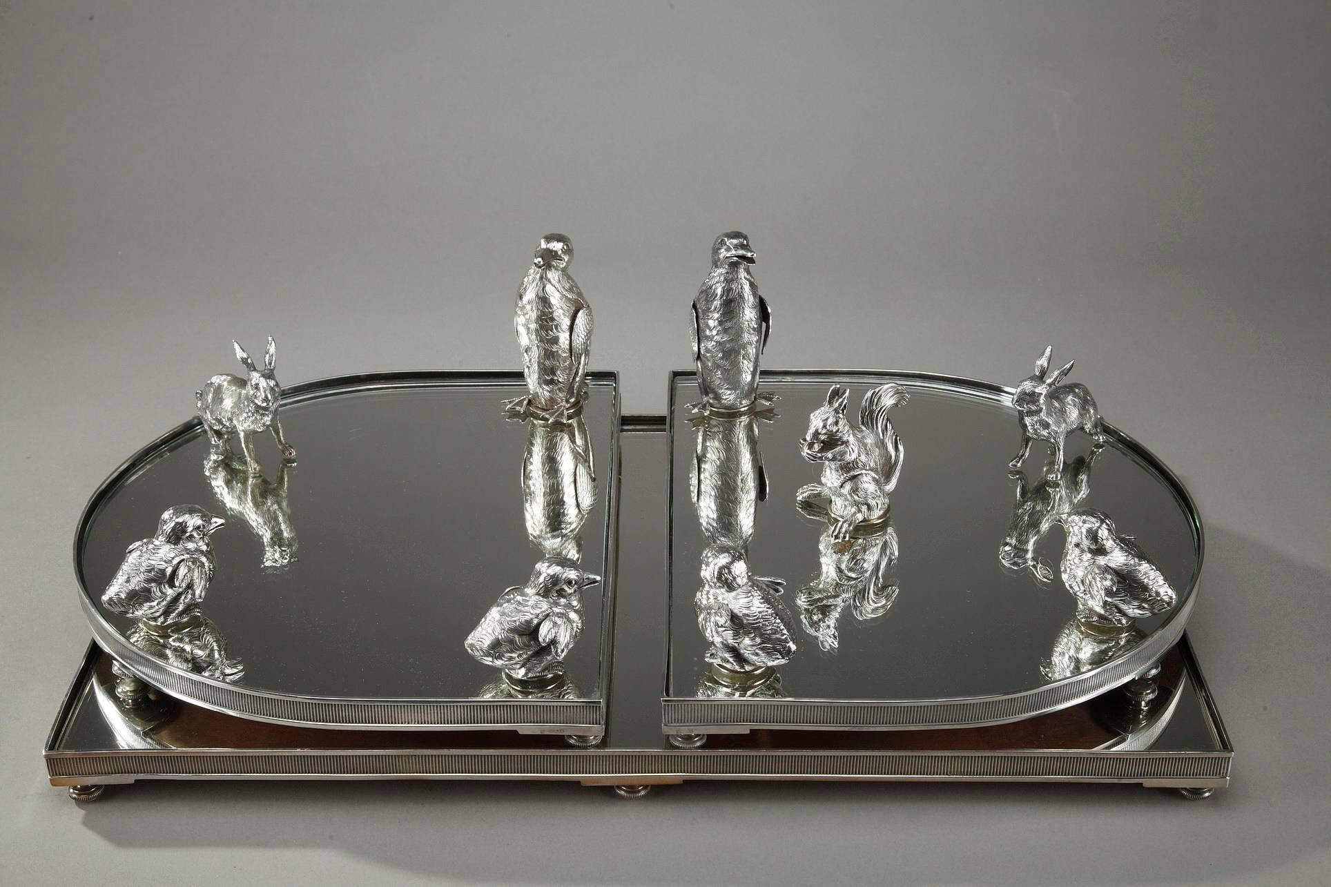 Large antique silver tray and table centrepiece composed of a rectangular central part and two semi-circular parts finely crafted in silver-plated and mirrors, topped by silver hares, squirrels and birds serving as salt and pepper cellar. Several