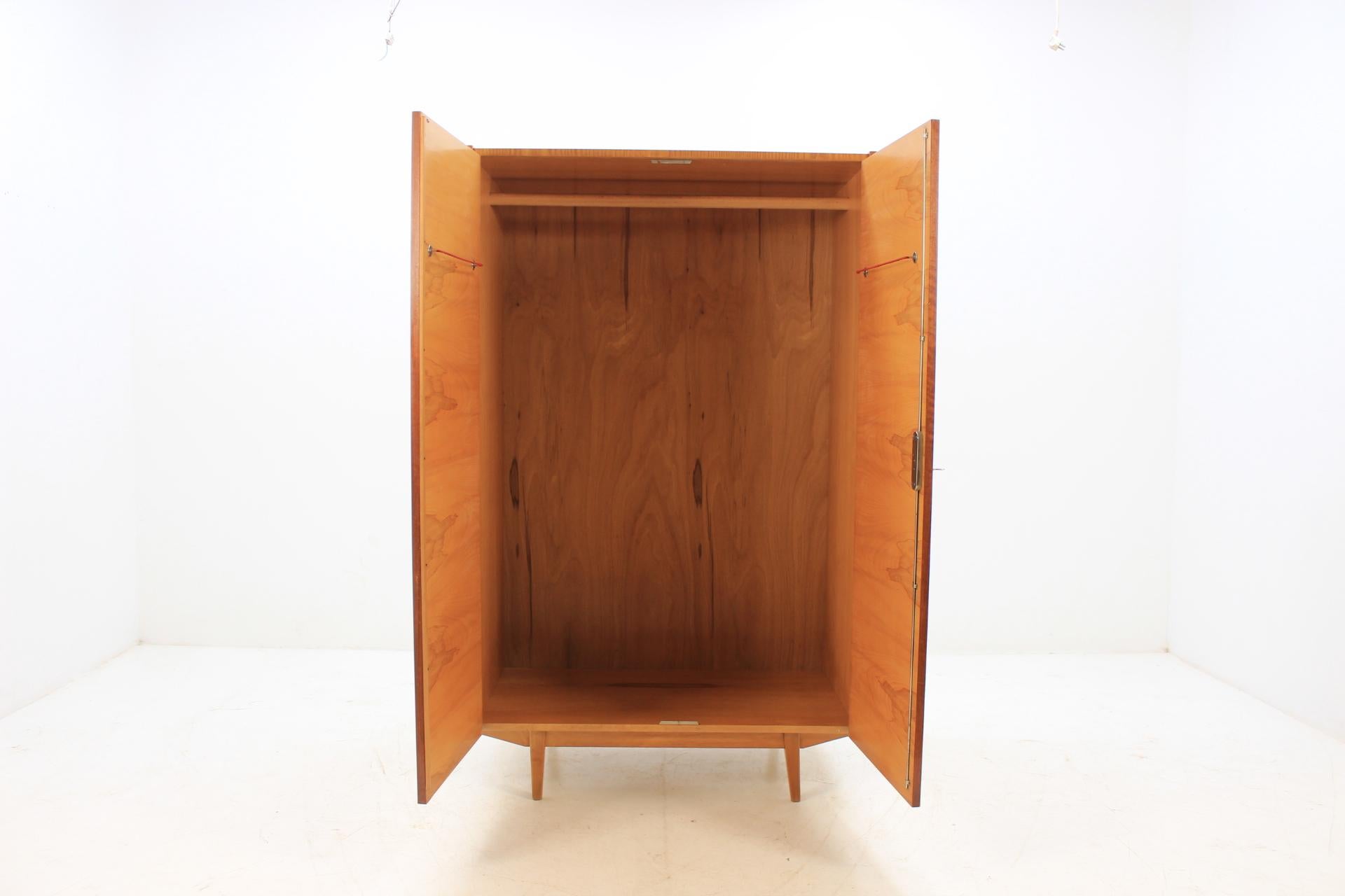 The item made of ashwood, and walnut. The doors are made in high gloss. Manufacture in Stolak, Tábor Czechoslovakia. Original, very preserved condition.