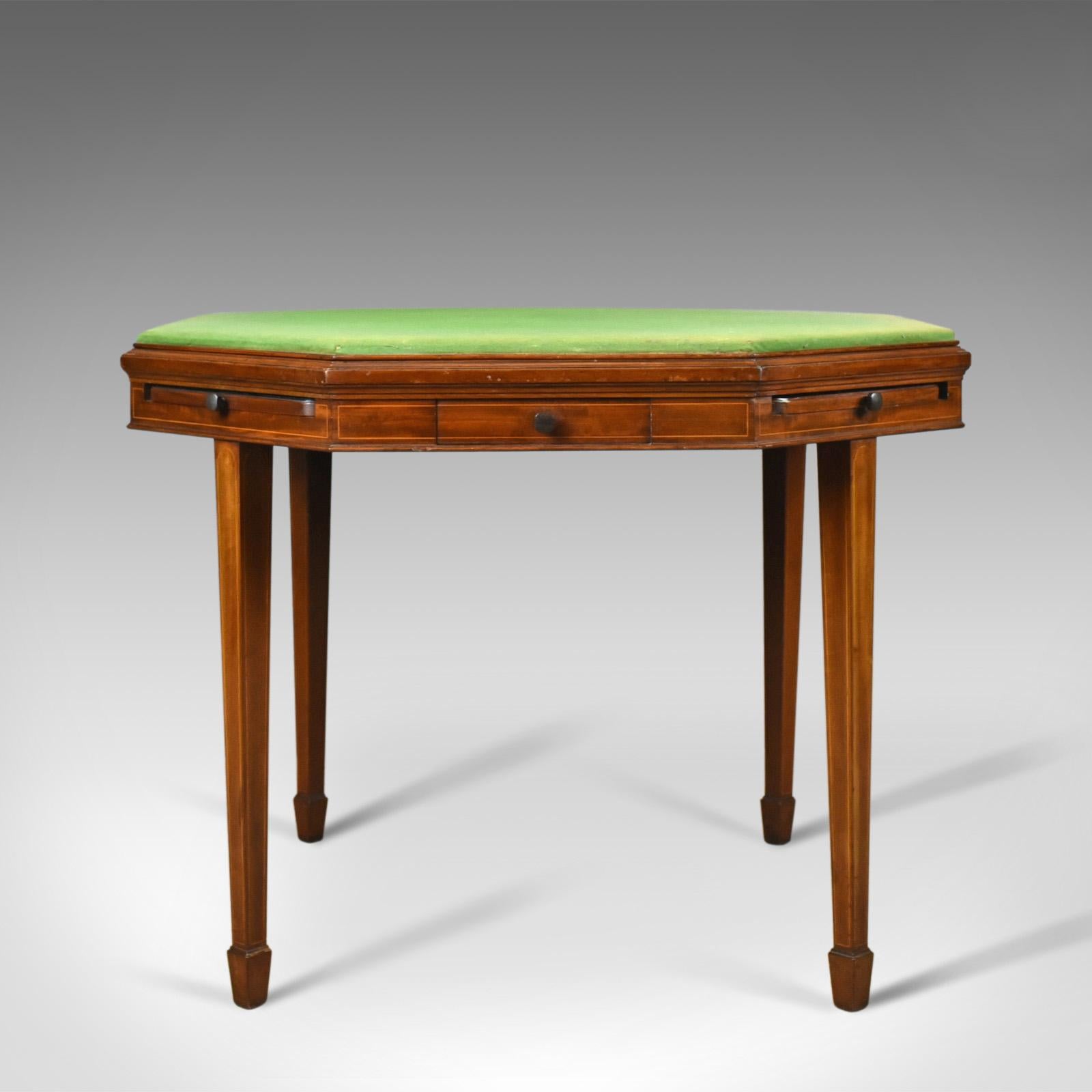 This is an antique metamorphic bridge card table by Trollope & Colls, London. An English, mahogany reversible games table dating to circa 1920-1930.

Of quality craftsmanship by prestigious cabinet makers Trollope & Colls
In select mahogany