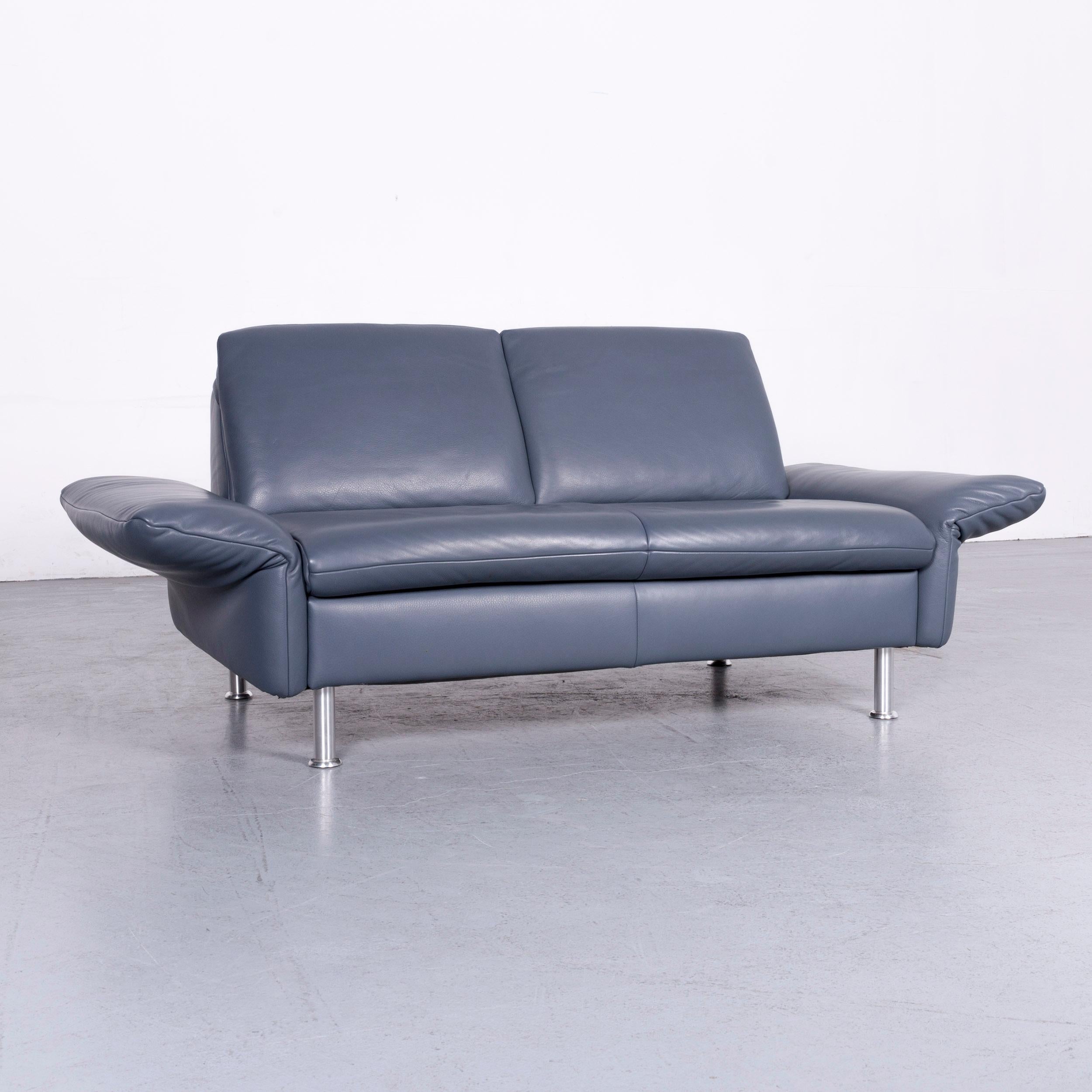 We bring to you a Koinor designer two-seat sofa blue leather couch.