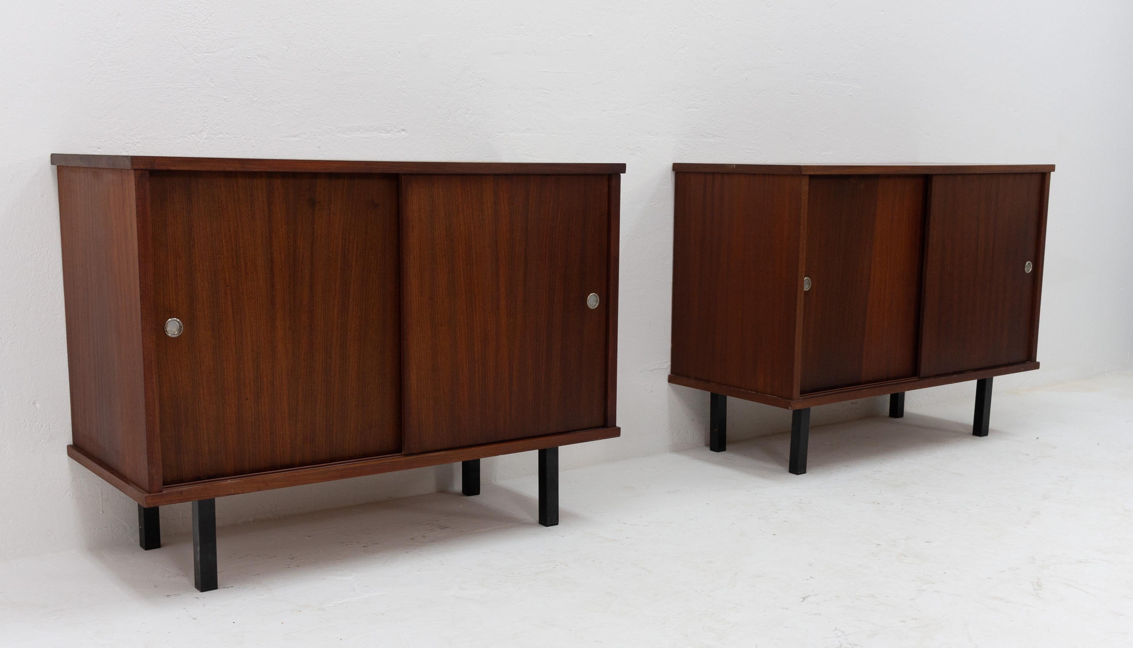 Two identical cabinets with sliding doors. Produced by Nissen Naarden in the Netherlands, 1960s. Nice understated design.