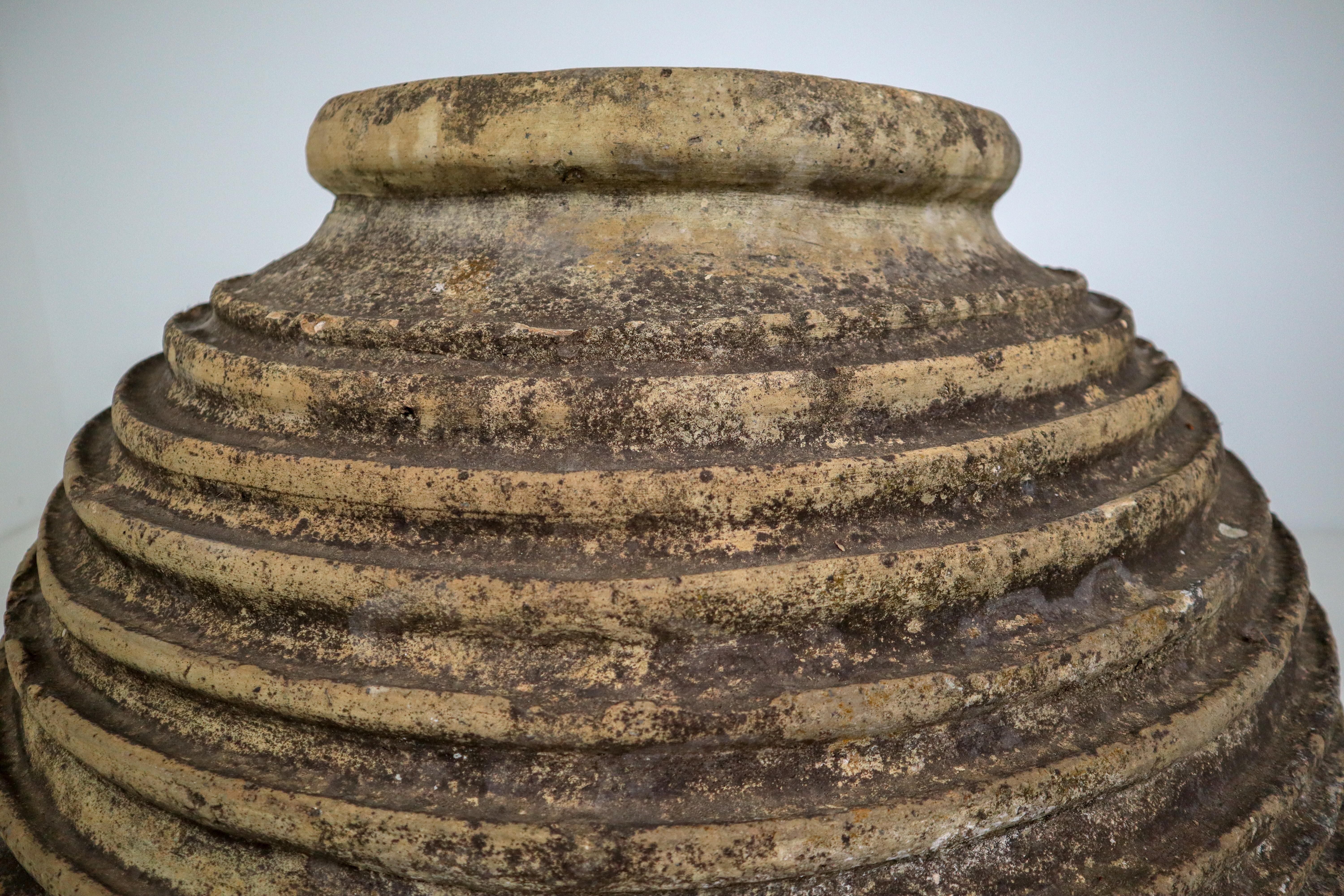Peloponnesian Koroni jar naturally weathered into a beautiful dark patina with lichen. Typical 