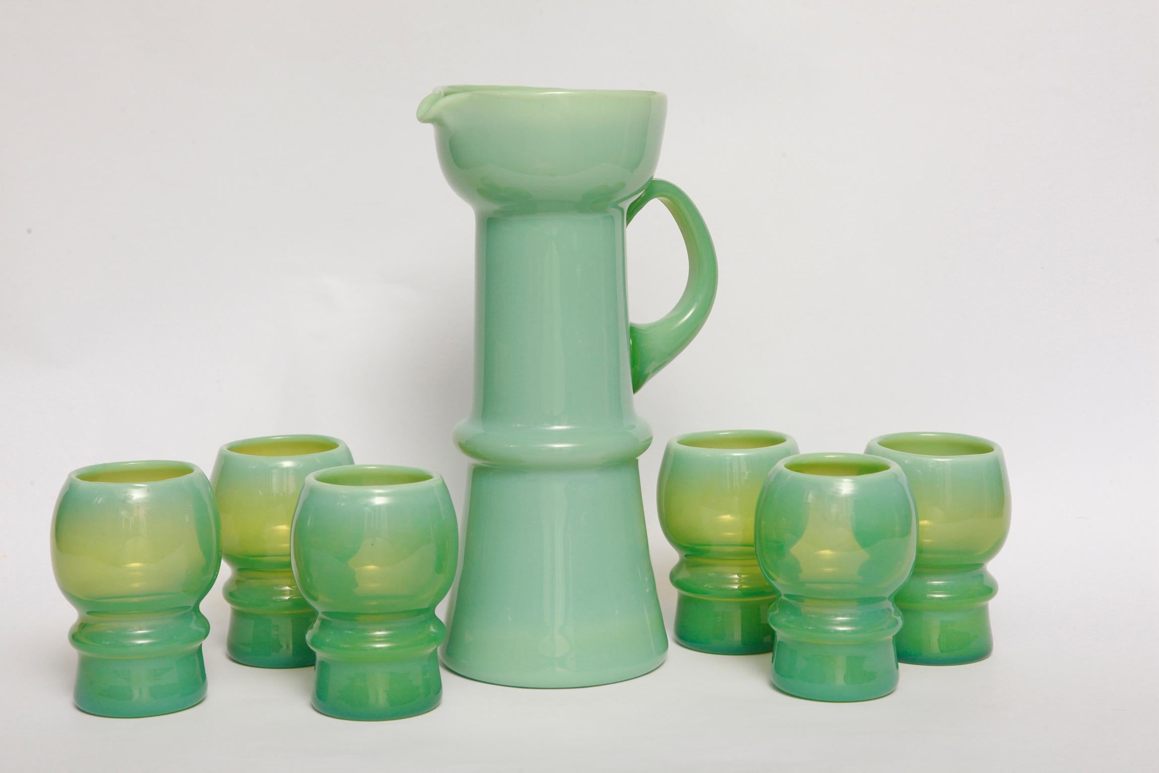 A glass set - a jug and six glasses designed by Zbigniew Horbow, from the 1960s. It is a beautiful and unique set of soda glass which is a decoration of every kitchen. Made of colored glass in the mass. The set has a very rare color.

Zbigniew