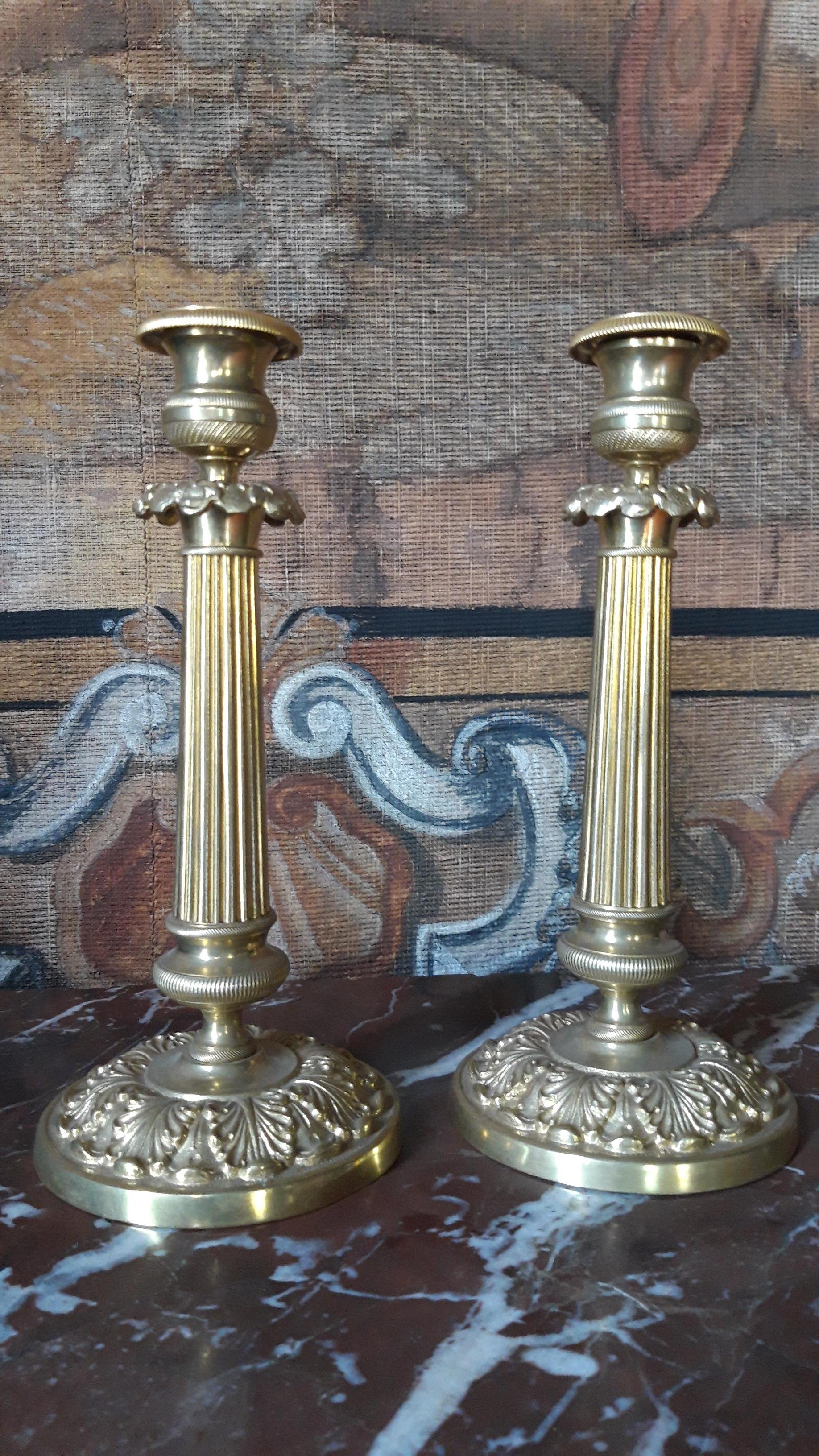 Pair of bronze candlesticks.
France, circa 1900.
Measures: H 25 cm.