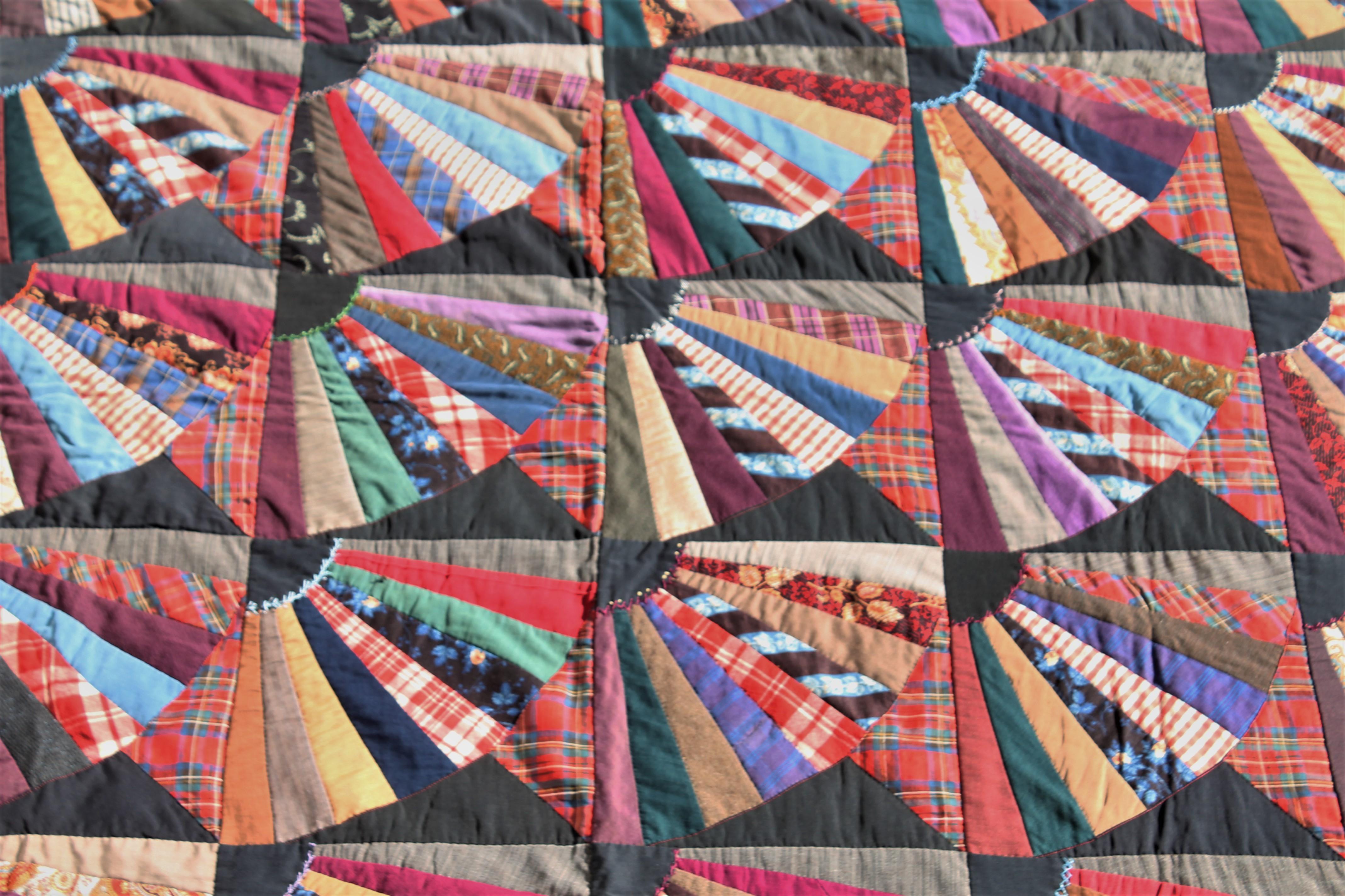 19th century crazy fan quilt contained in squares. The condition is very good and lots of amazing details throughout the quilt. This quilt is from Lancaster County, Pennsylvania.