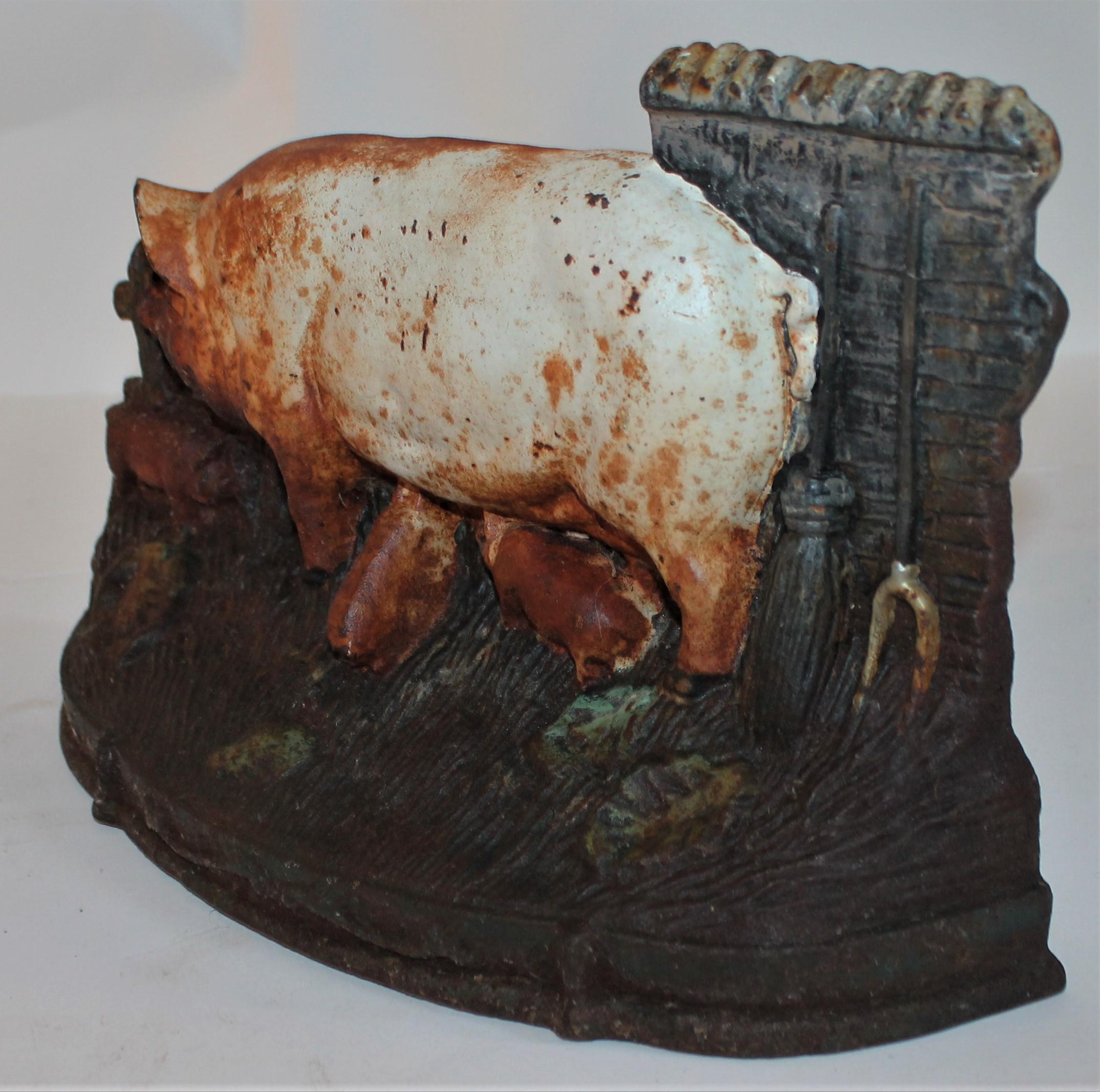 19th century original painted momma pig and baby pigs cast iron doorstop. Possibly a Hubley. Its unsigned.