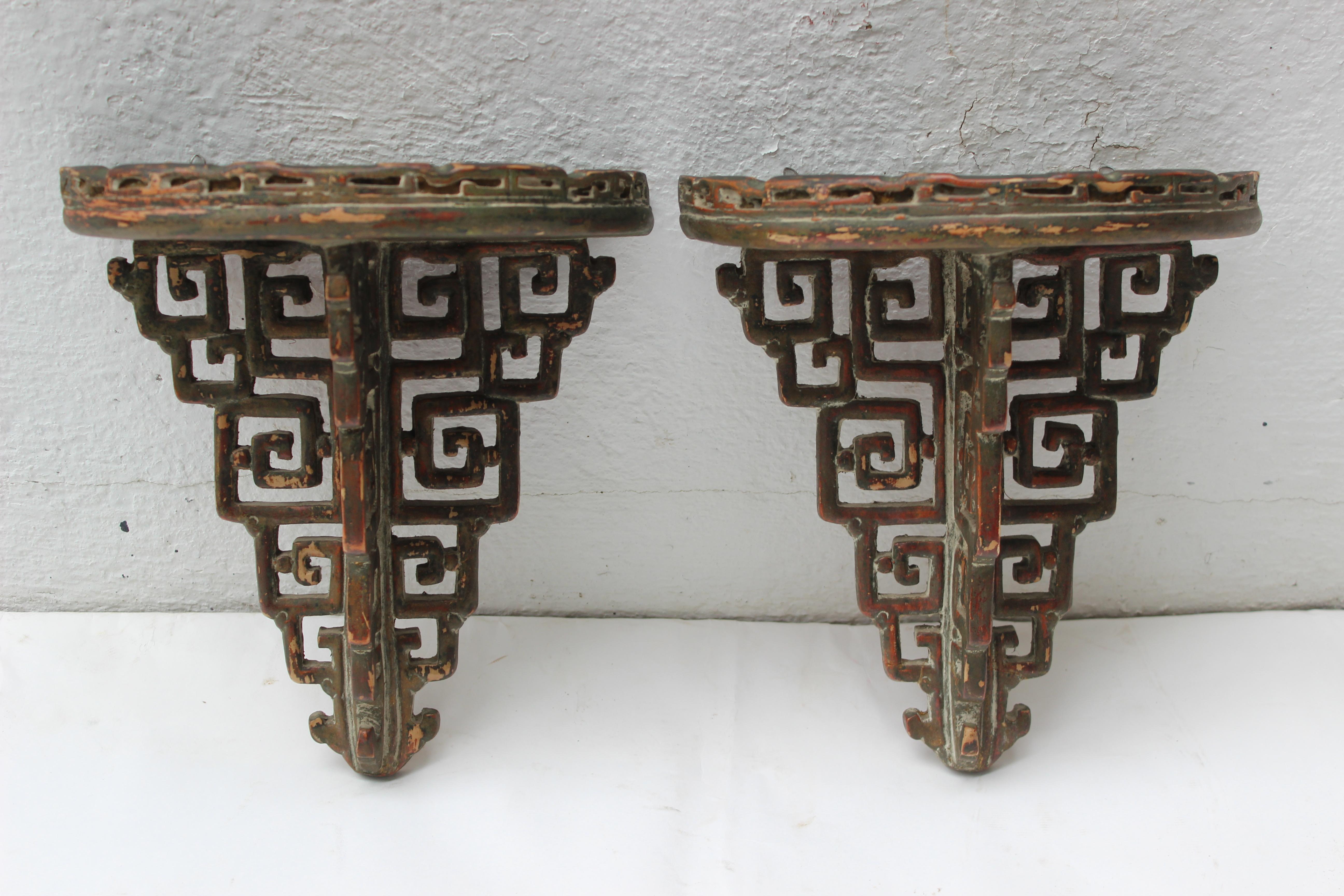 Pair of Asian style ceramic wall brackets.