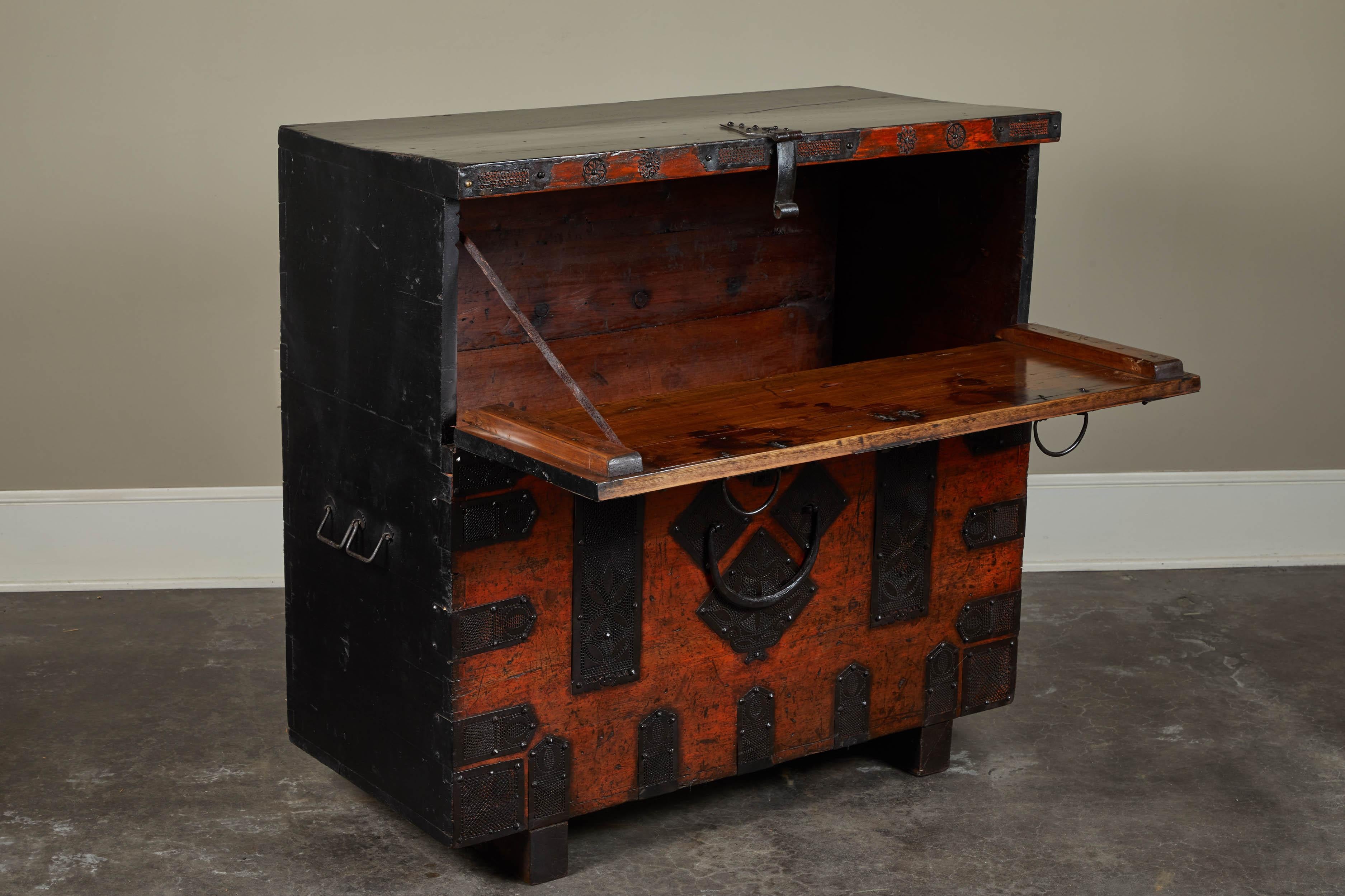Rare 19th century Korean chest. Unusual size makes it a rare piece. Beautiful iron hardware decorate the face and lid. Two available, not quite a pair. Sold individually.