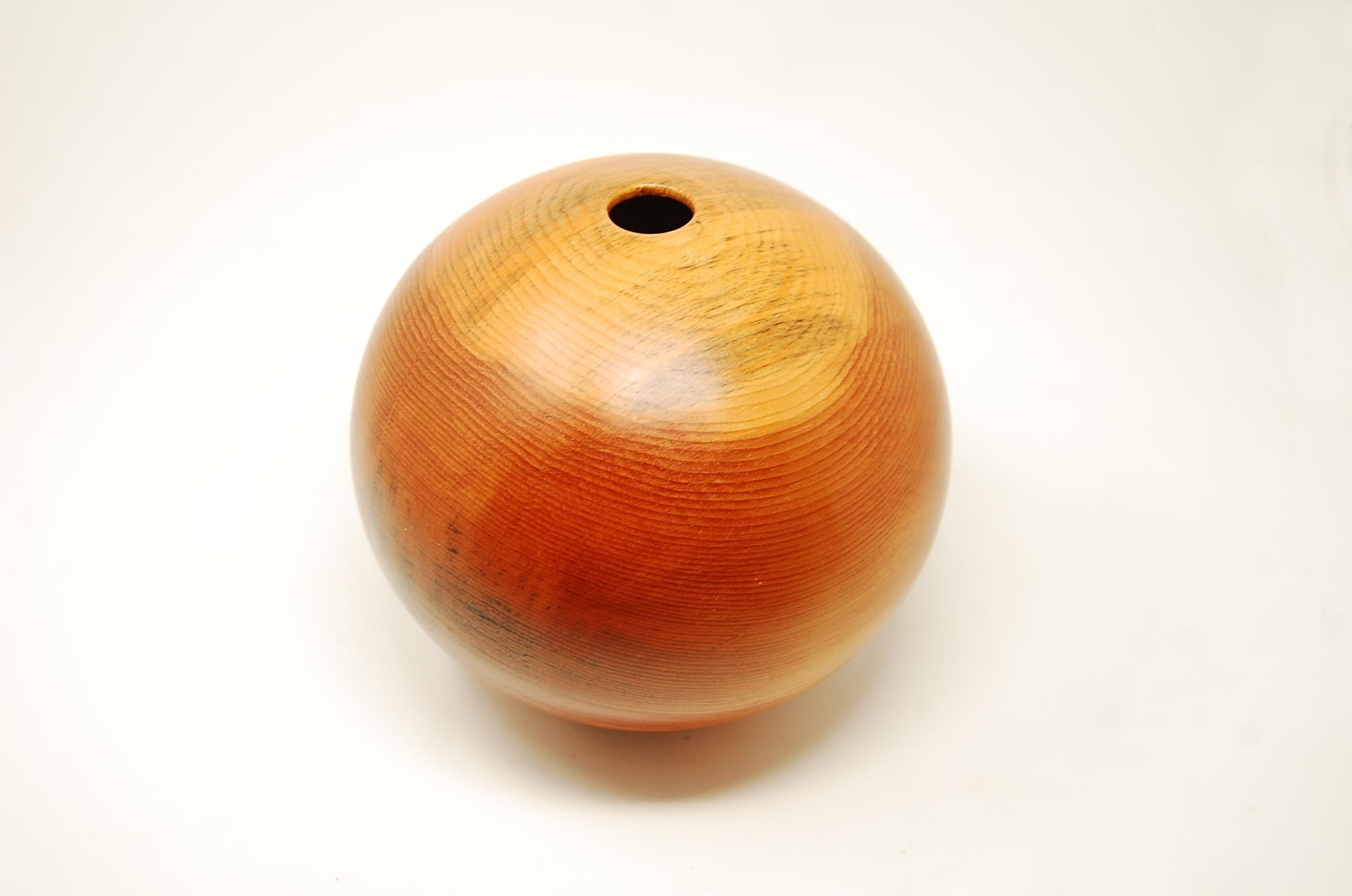 Hollow form vase in white pine by John Sage, circa 1997. Measures: Stands 8