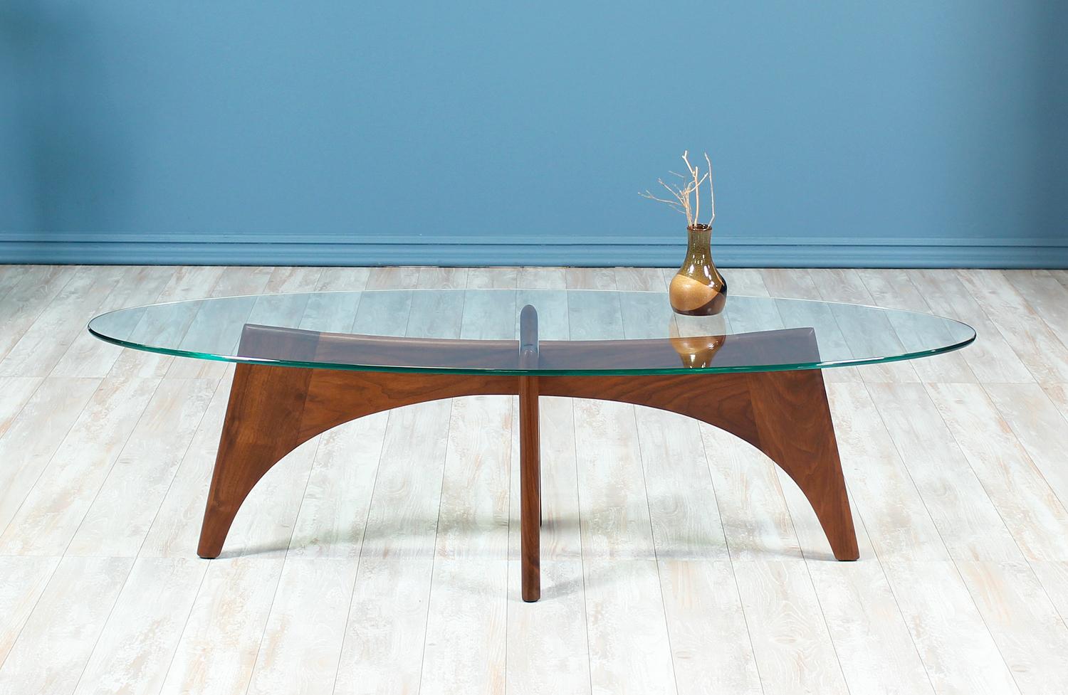 Designer: Adrian Pearsall
Manufacturer: Craft Associates
Country of origin: United States
Date of manufacture: 1960-1969
Materials: Walnut wood, new glass top
Period style: Mid-Century Modern

Condition: Excellent
Extra conditions: Newly