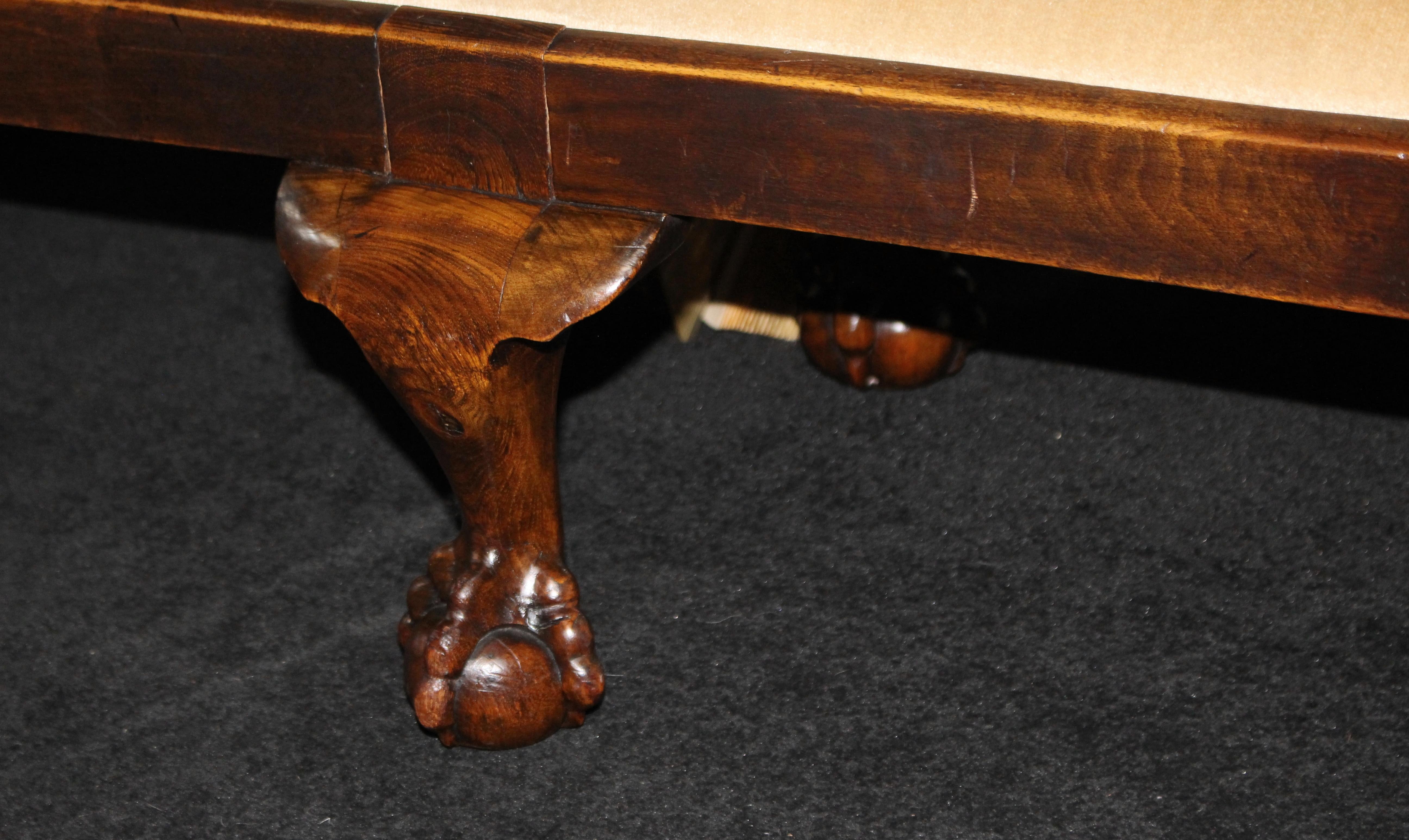 Mahogany Long Carved Walnut Six Footed Ball and Claw Stool