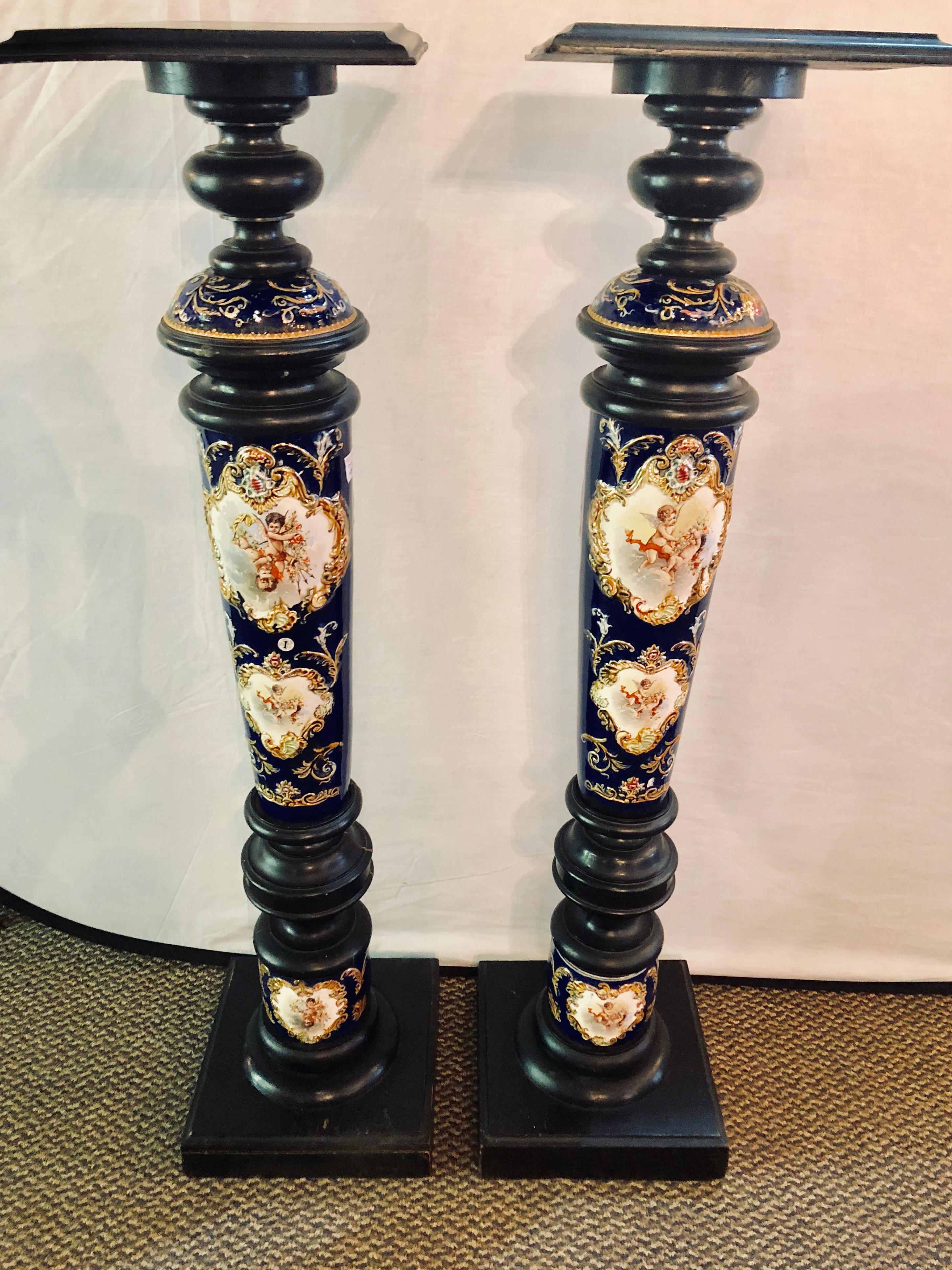 Pair of Royal Vienna Style Porcelain and Ebony Column Pedestals 1