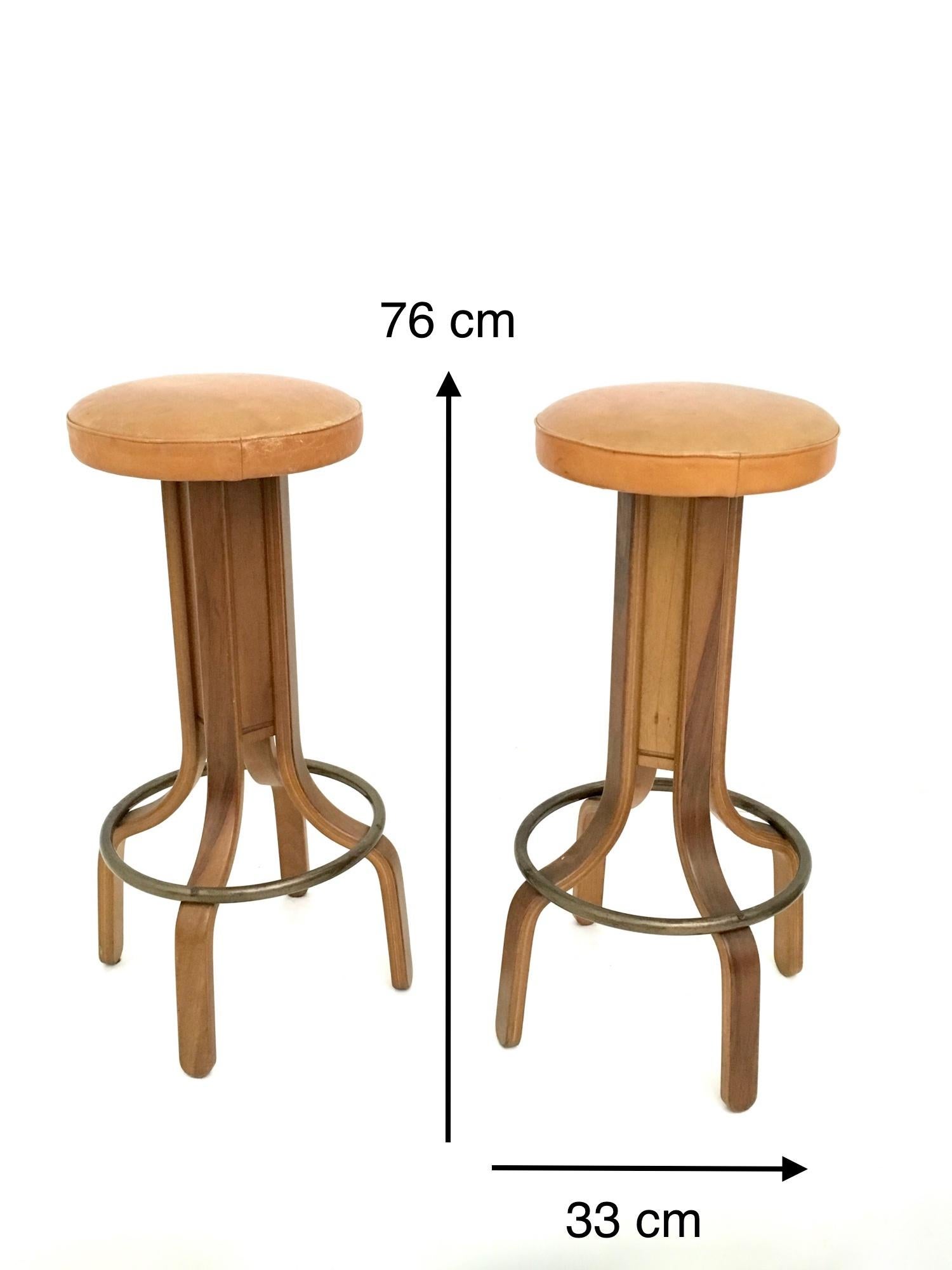Late 20th Century Four Postmodern Camel Color Leather & Walnut Plywood Revolving Stools, Italy