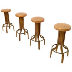 Set of Four Camel Color Leather & Walnut Plywood Revolving Stools, Italy 1970s